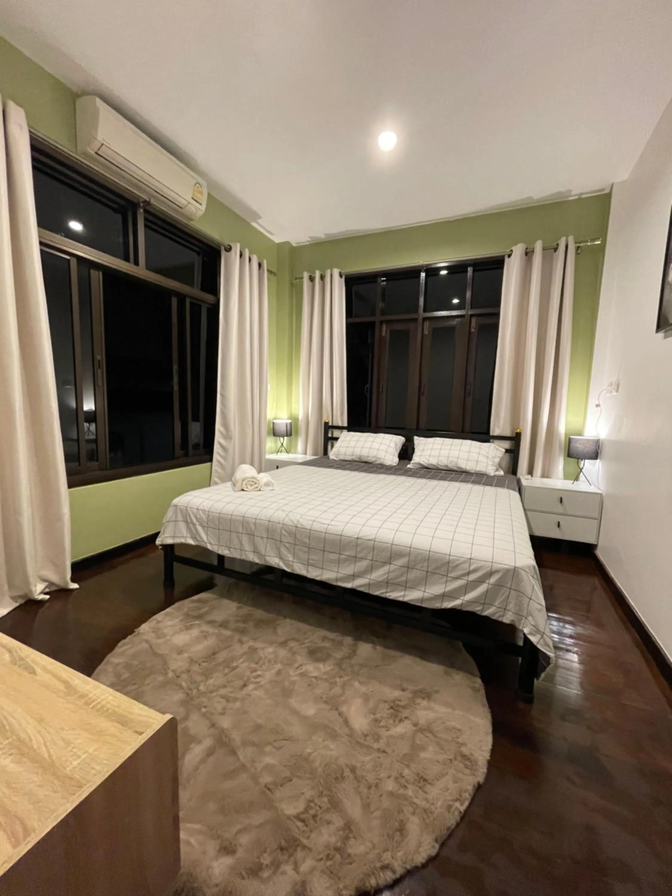 Bed in Aisawan Resort villa