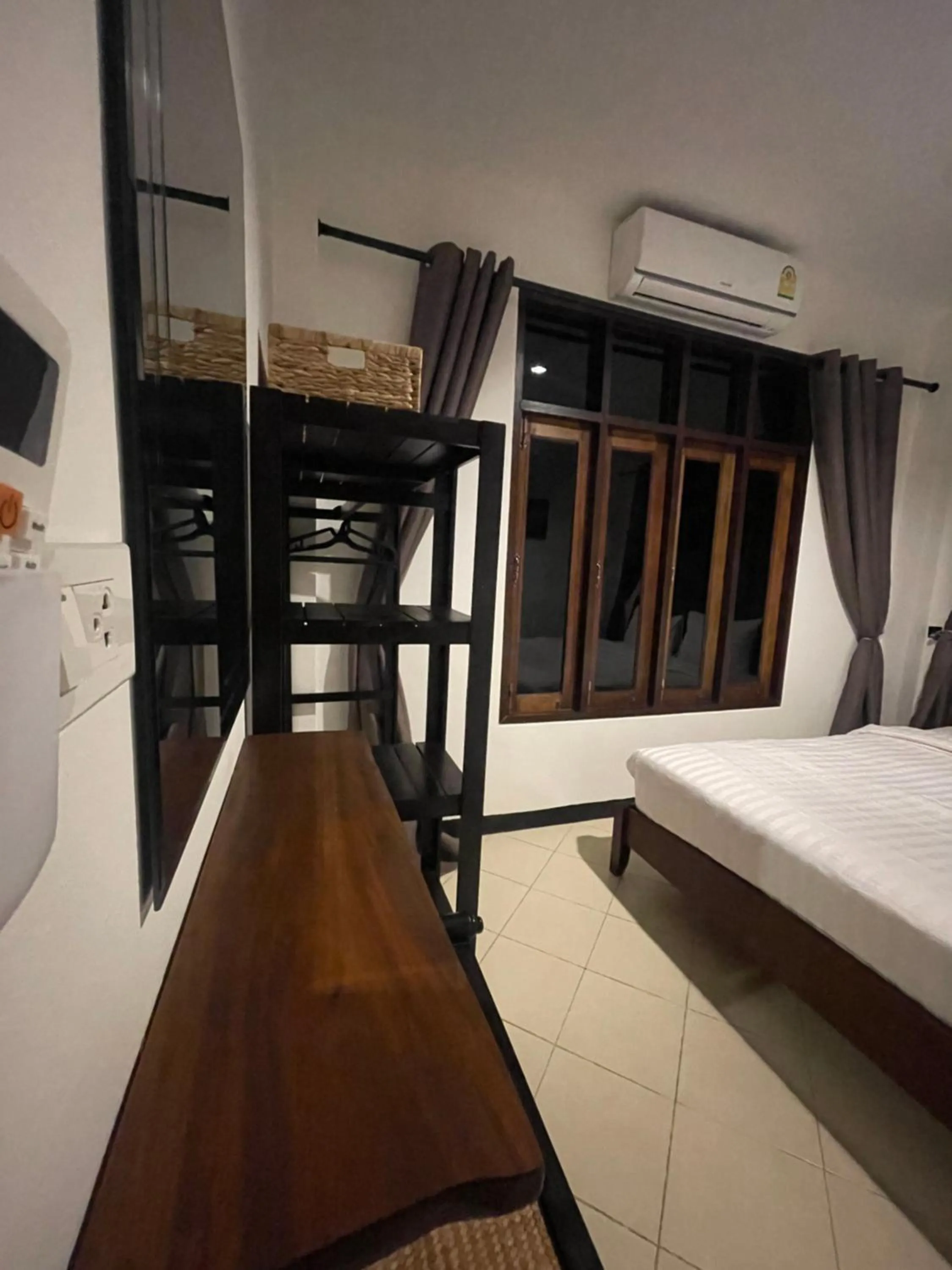 Bed in Aisawan Resort villa
