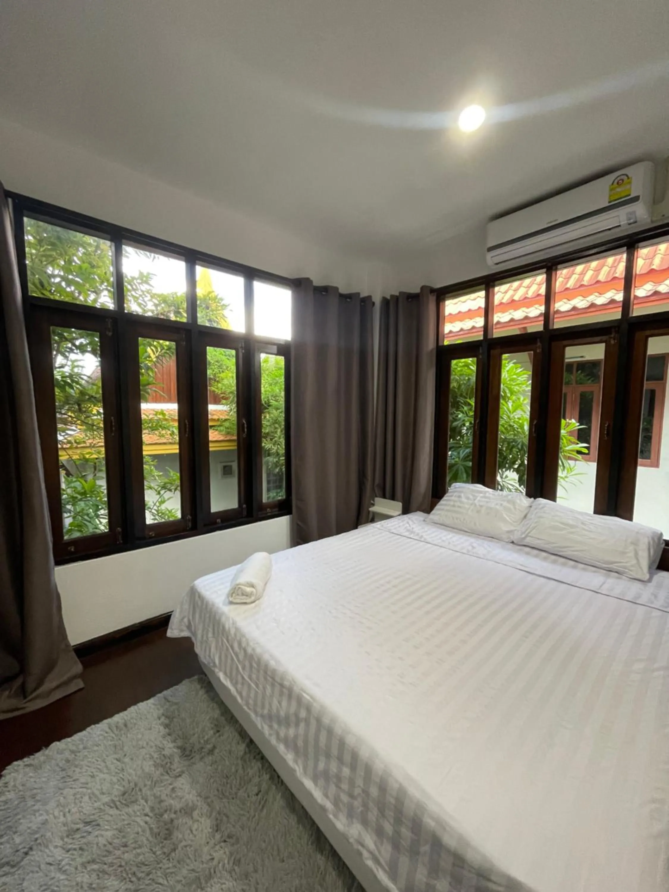 Bed in Aisawan Resort villa