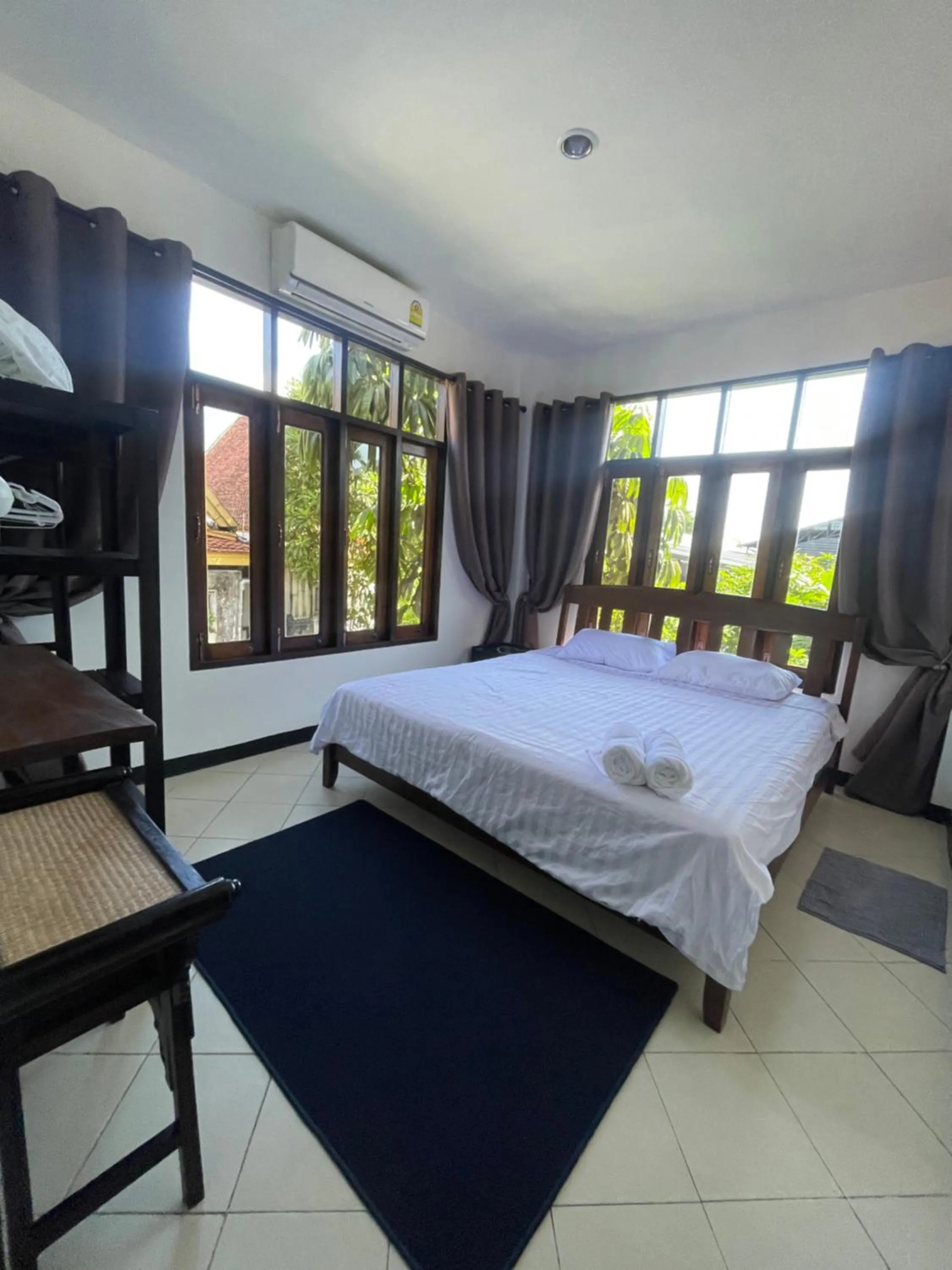 Bed in Aisawan Resort villa