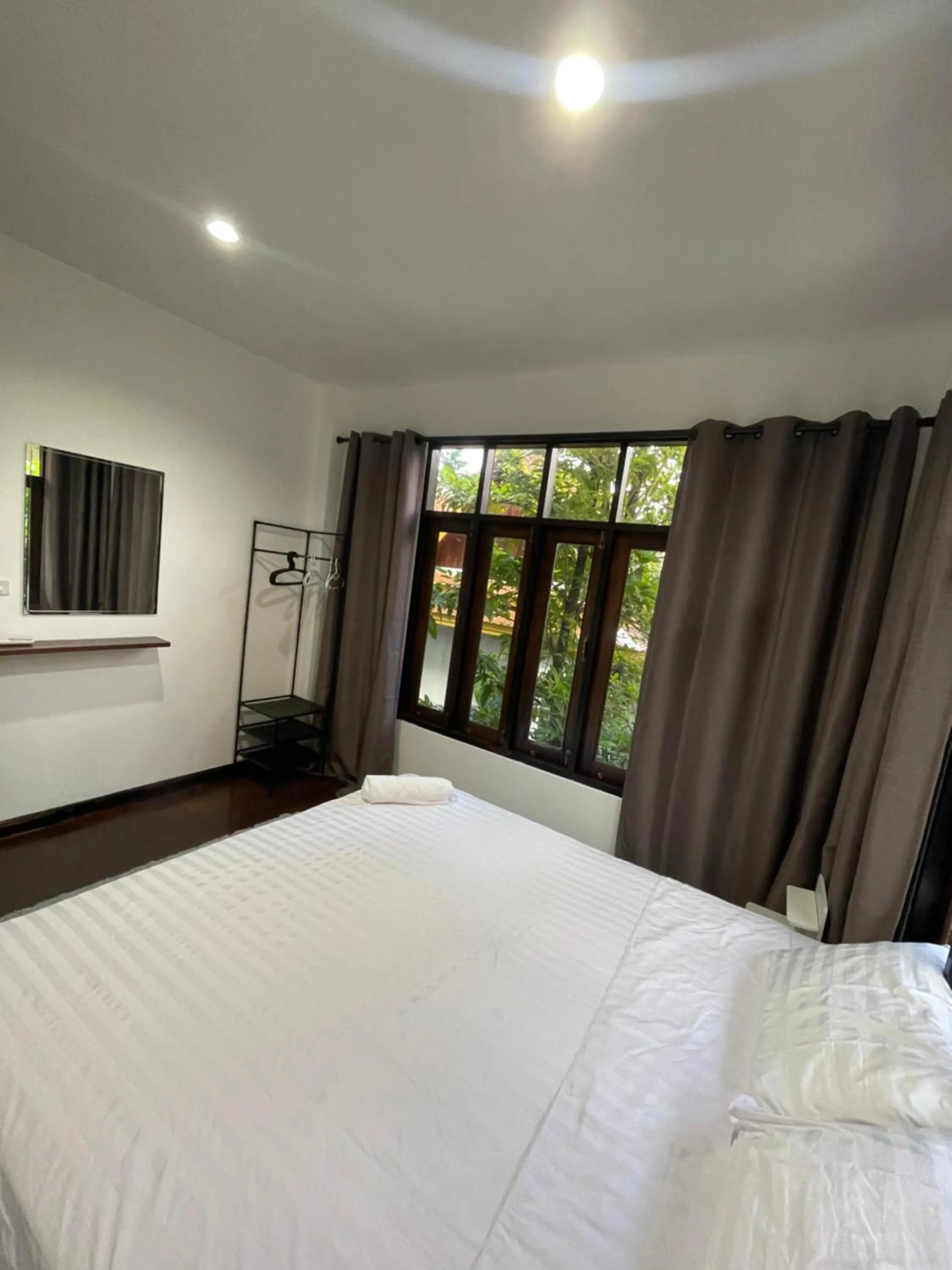 Bed in Aisawan Resort villa