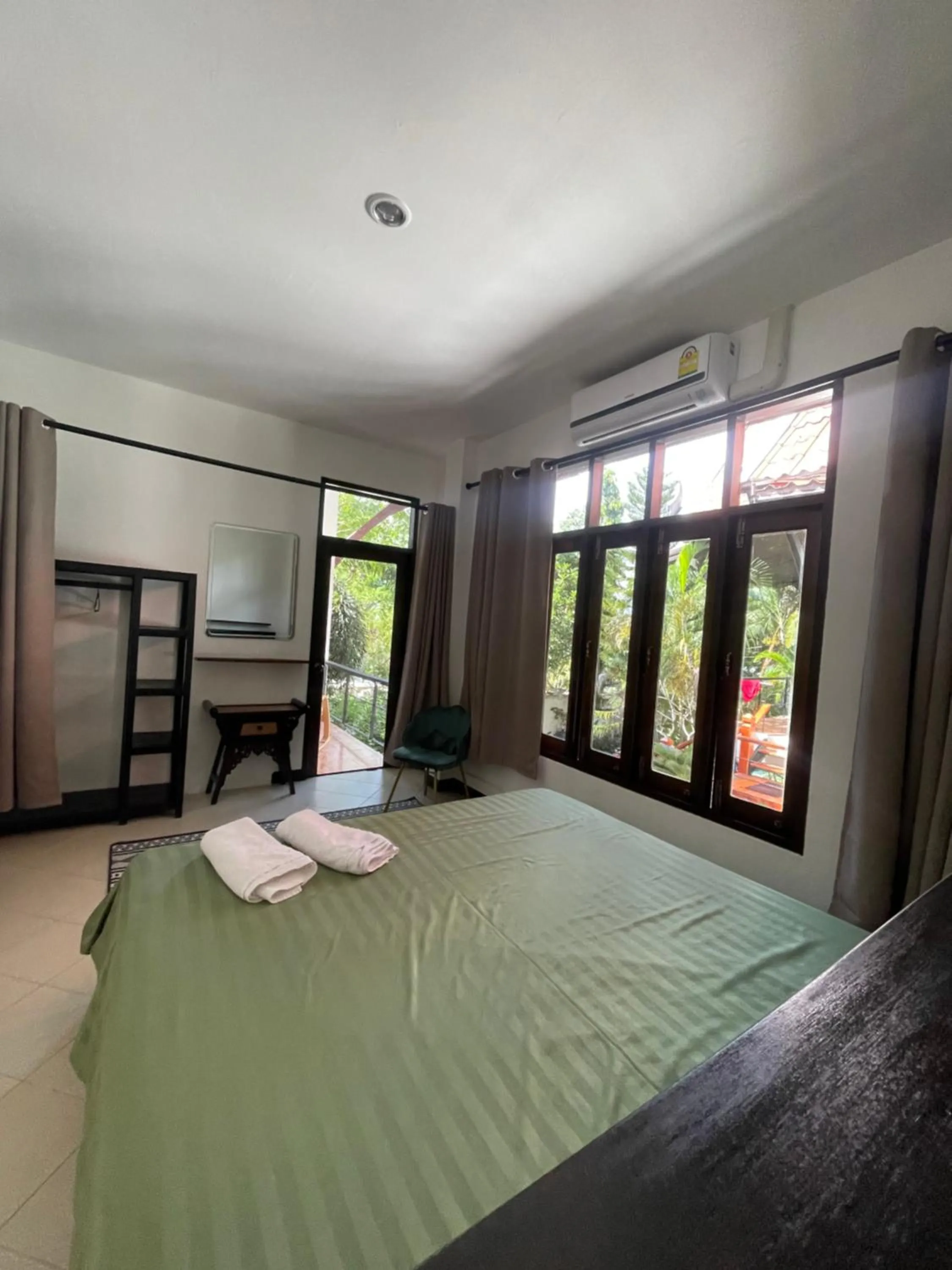 Bed in Aisawan Resort villa