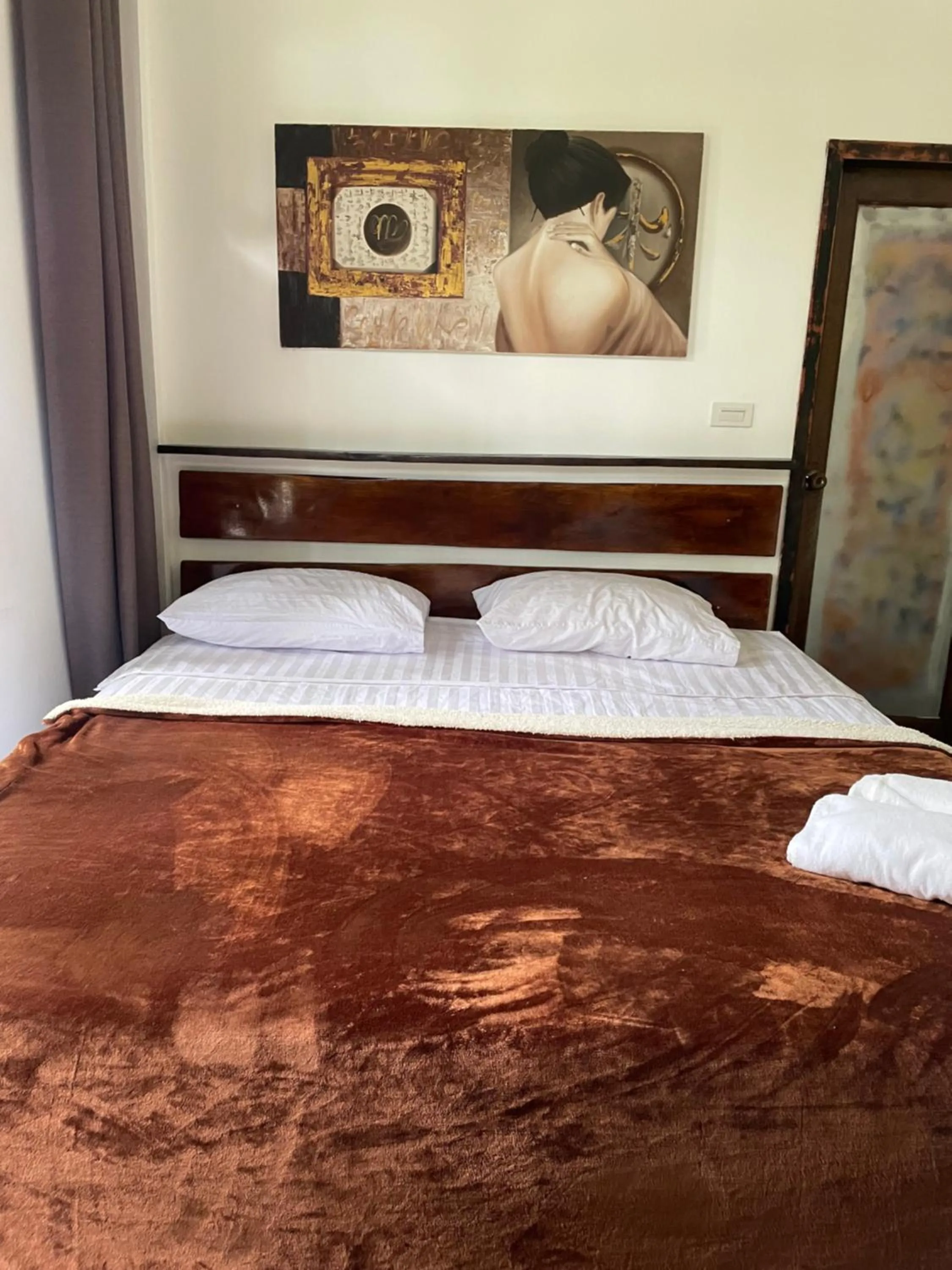 Bed in Aisawan Resort villa