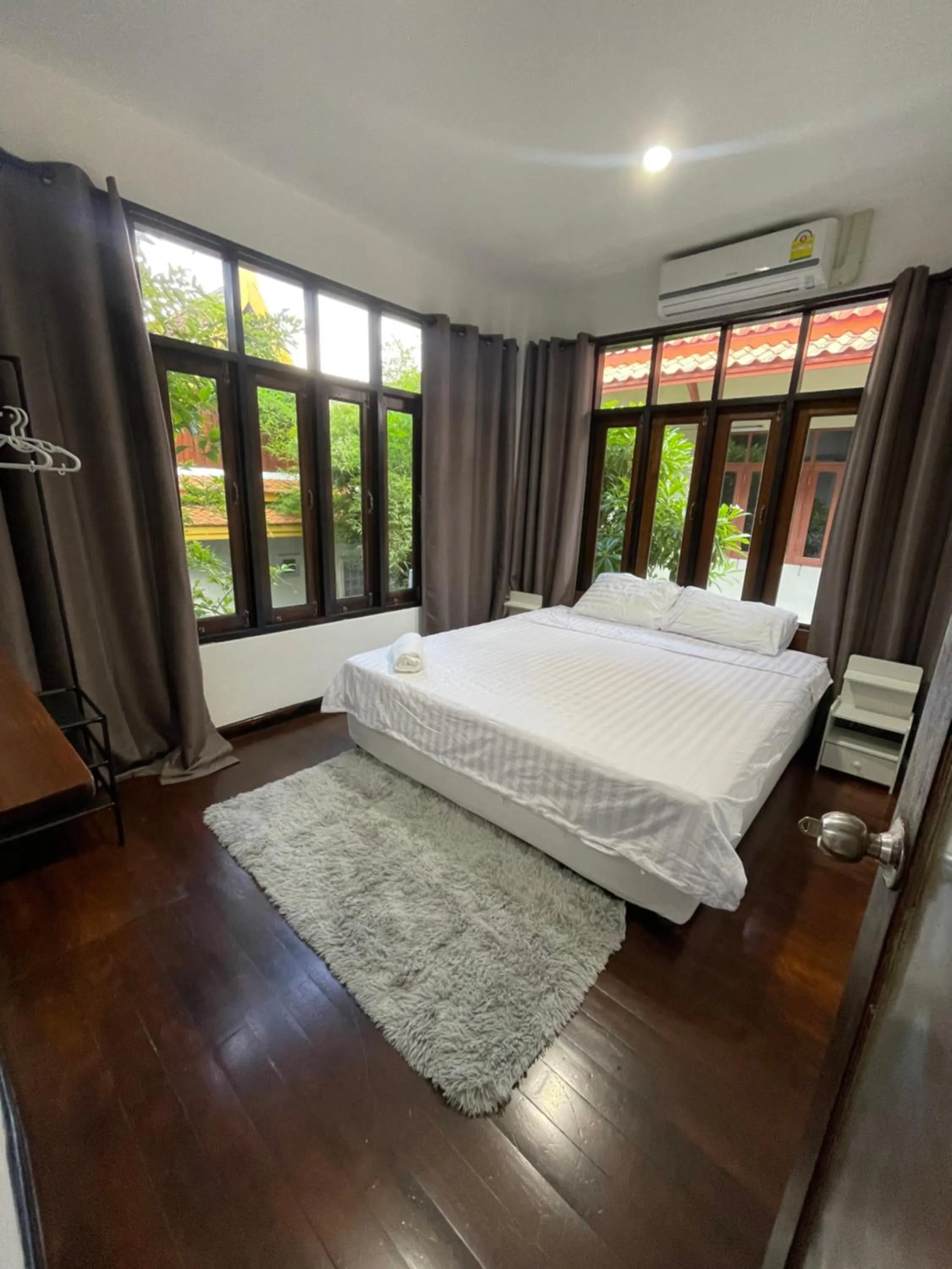 Bed in Aisawan Resort villa