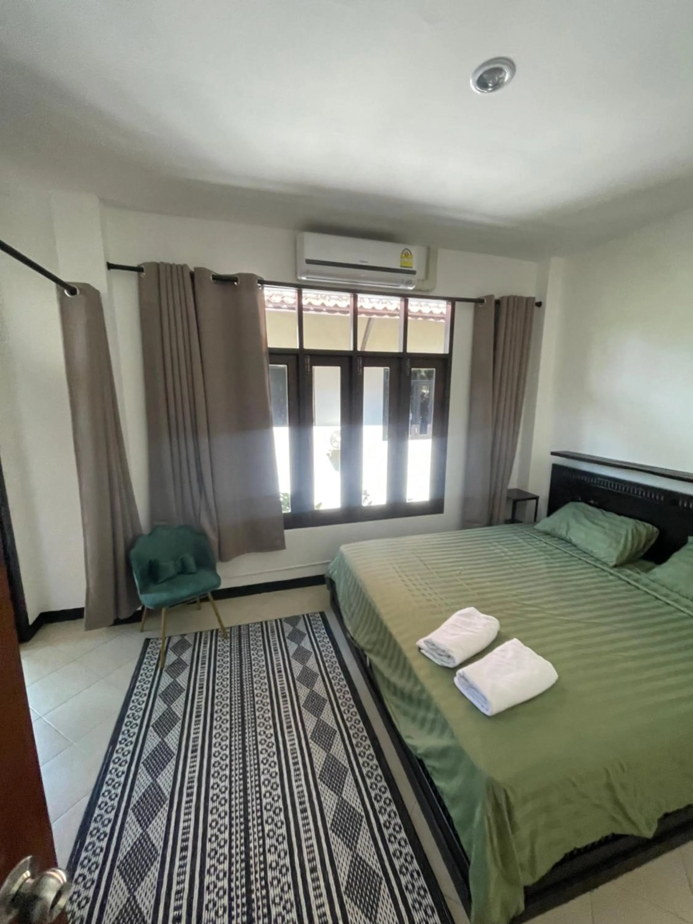 Bed in Aisawan Resort villa