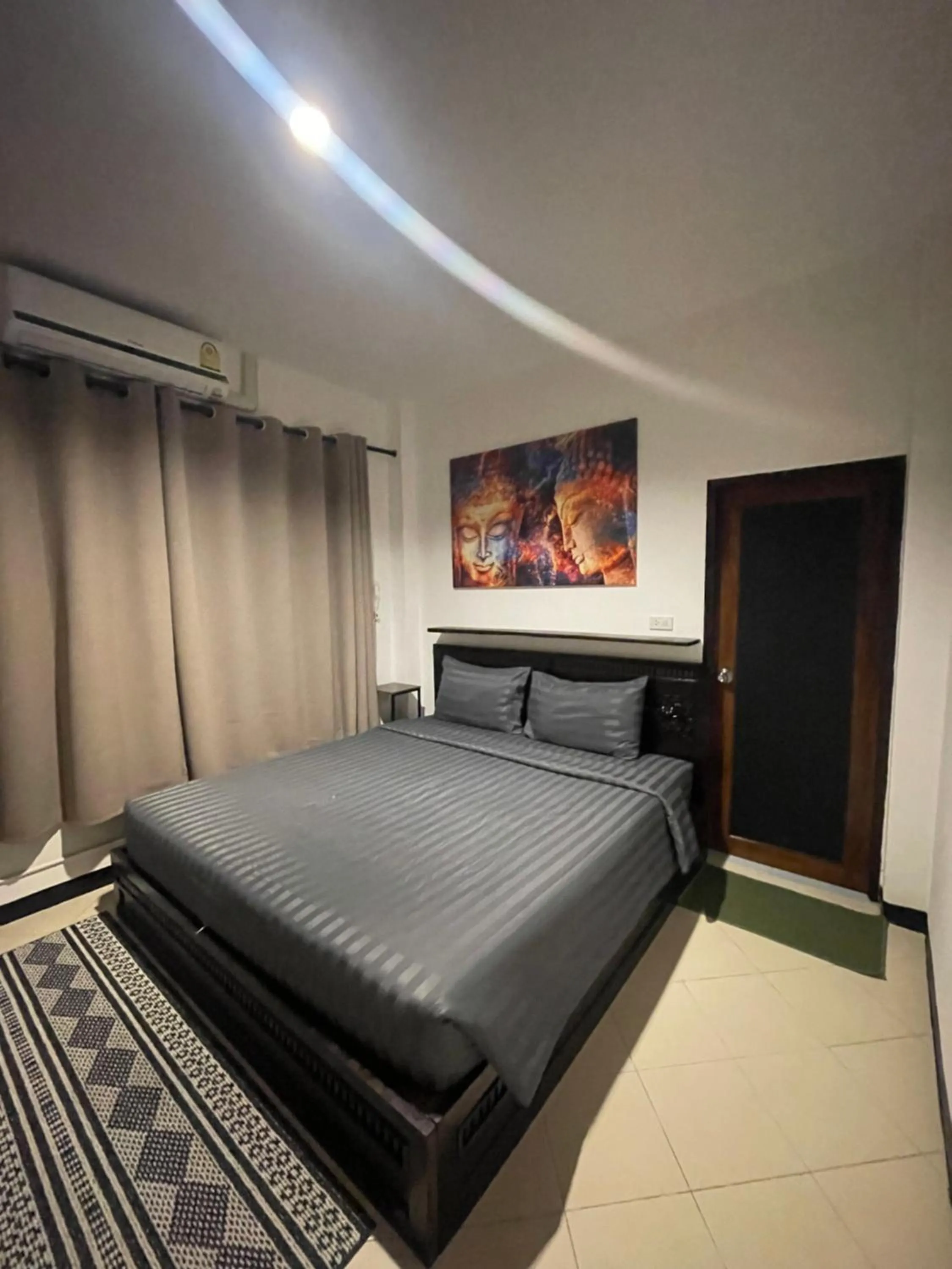 Bed in Aisawan Resort villa