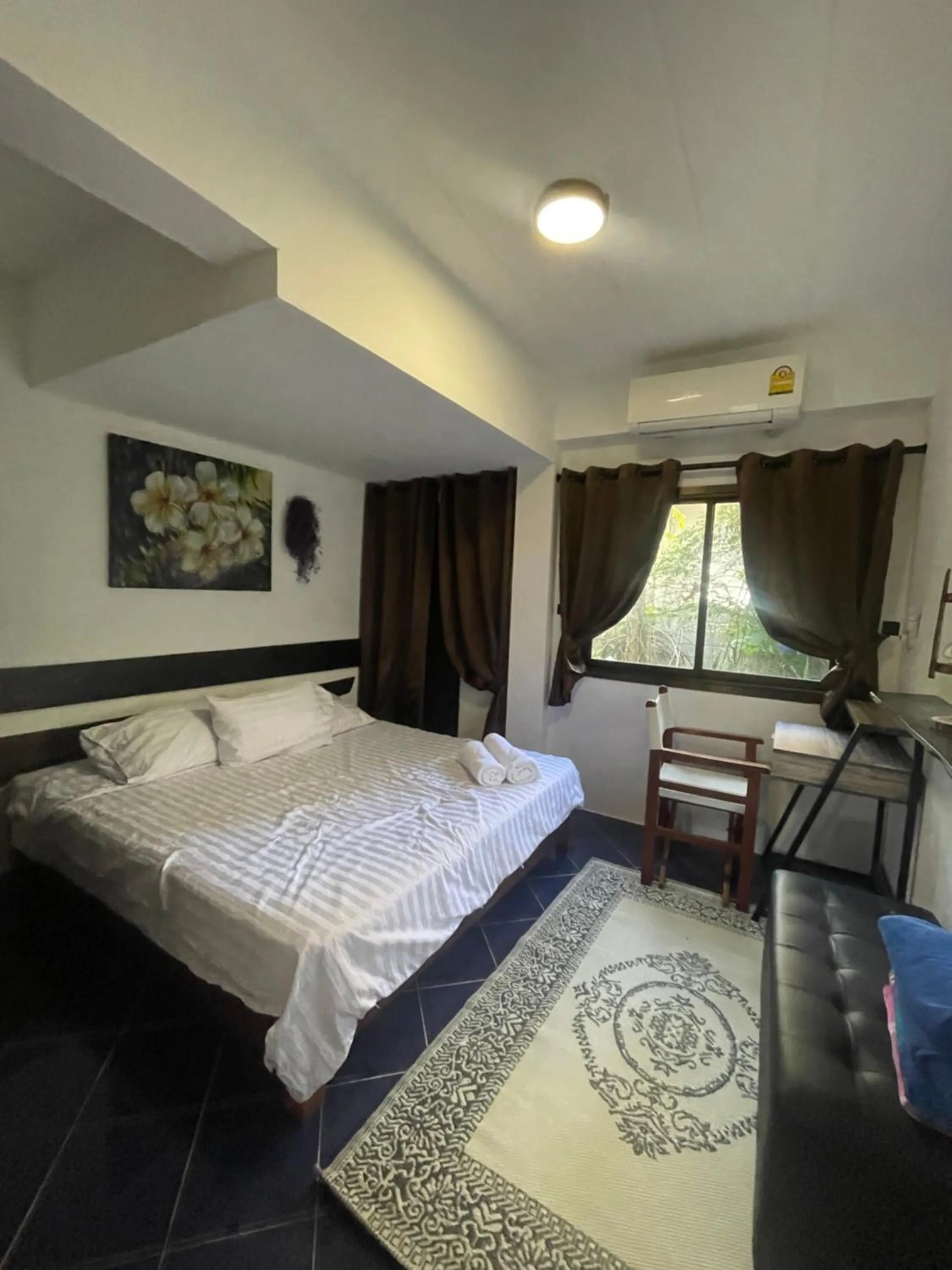 Bed in Aisawan Resort villa