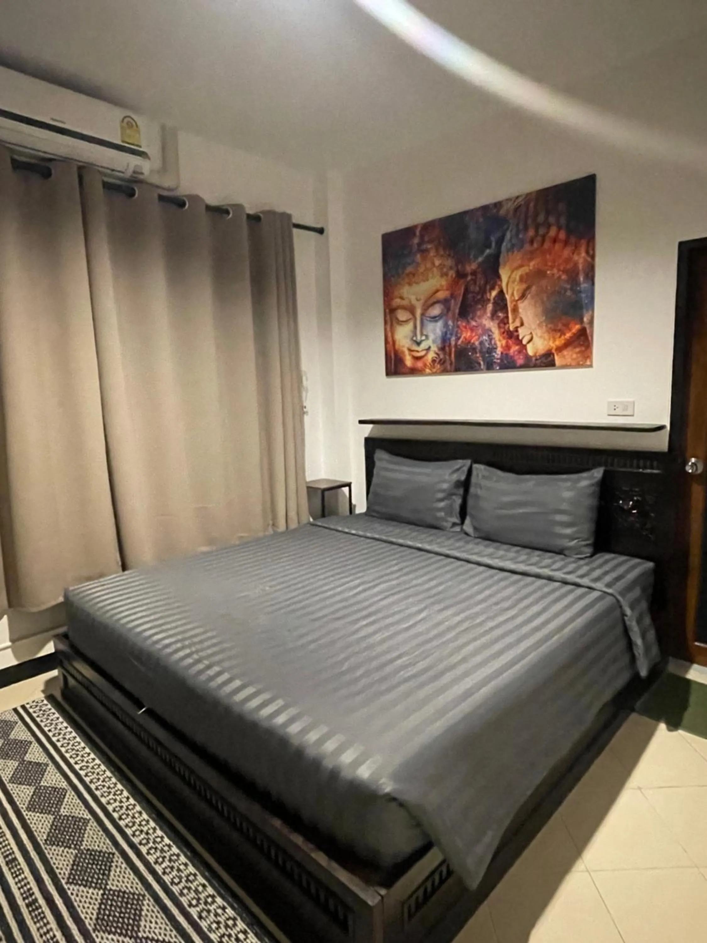 Bed in Aisawan Resort villa