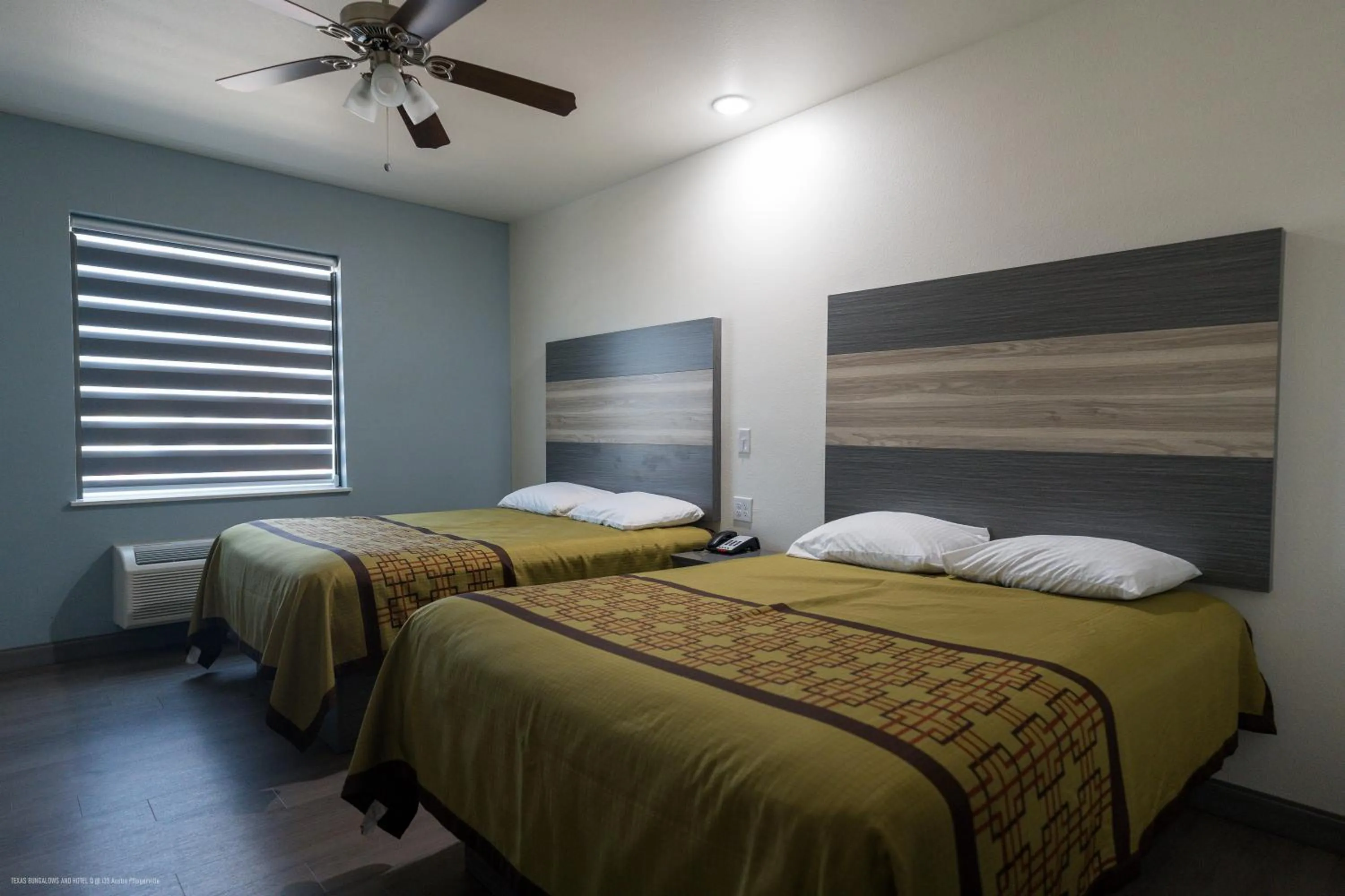 Bedroom, Bed in Texas Bungalows Hotel and Hotel Que at i35 Austin Pflugerville