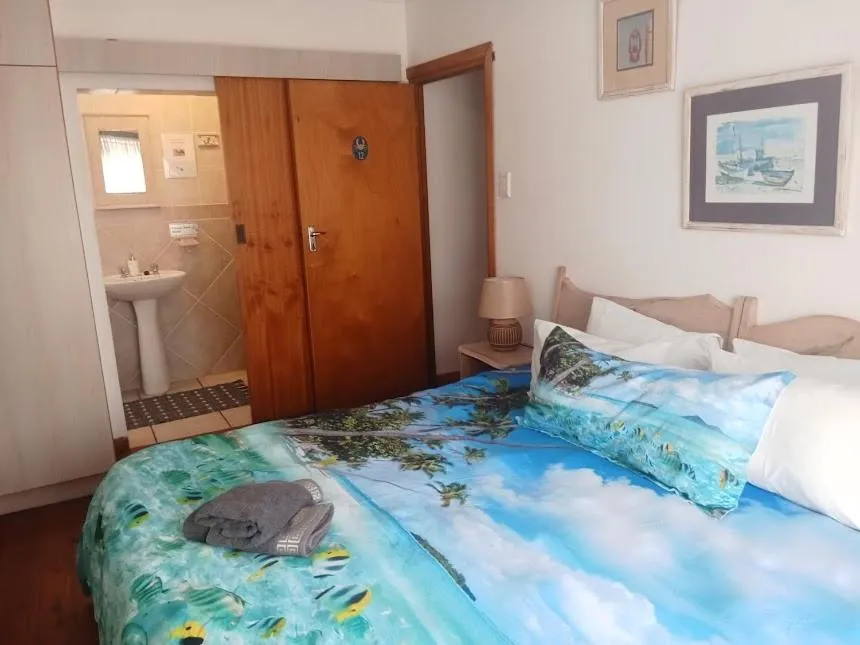 Bed in Aquarius Bed and Breakfast