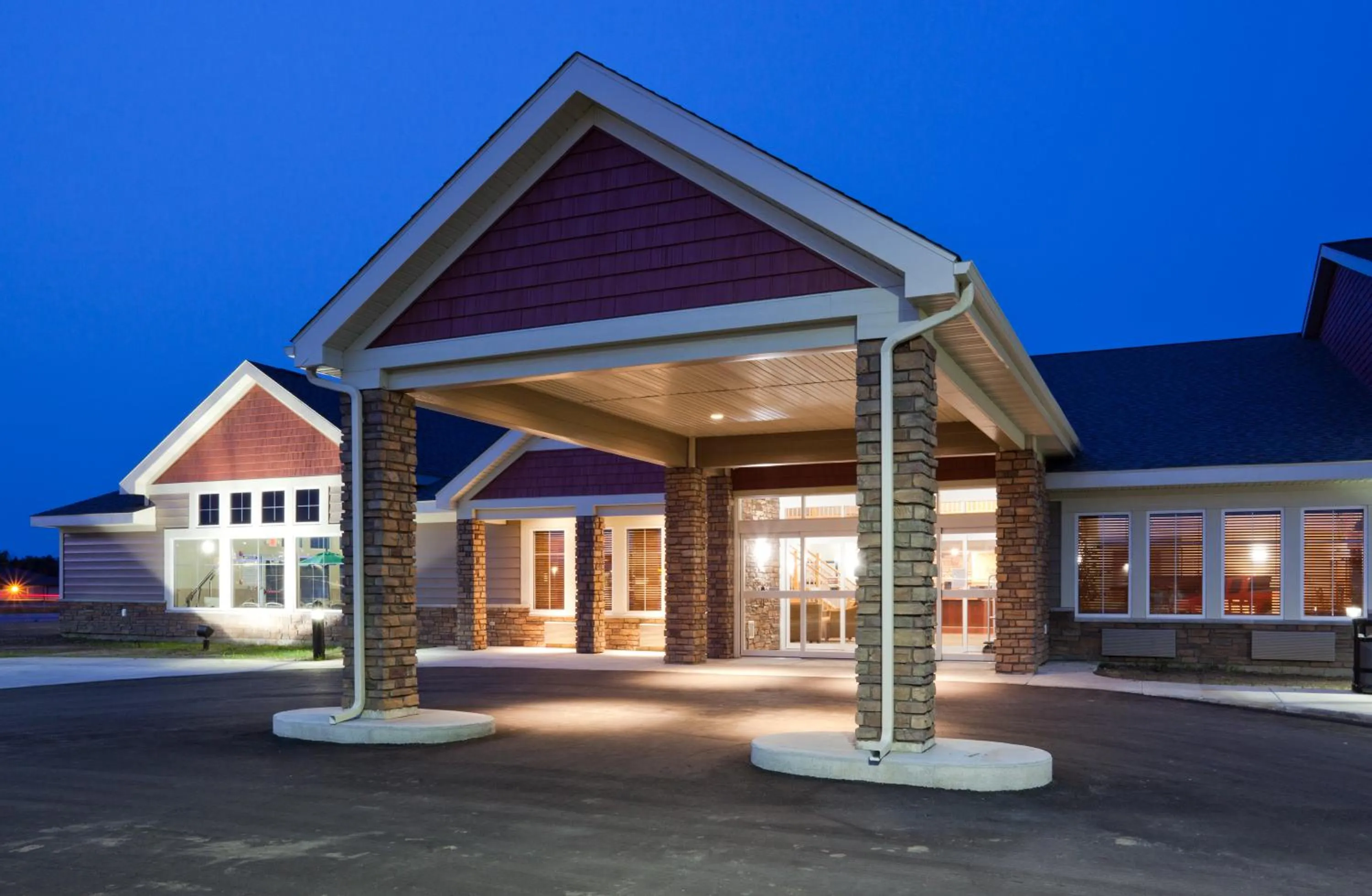 Facade/entrance in AmericInn by Wyndham Hawley