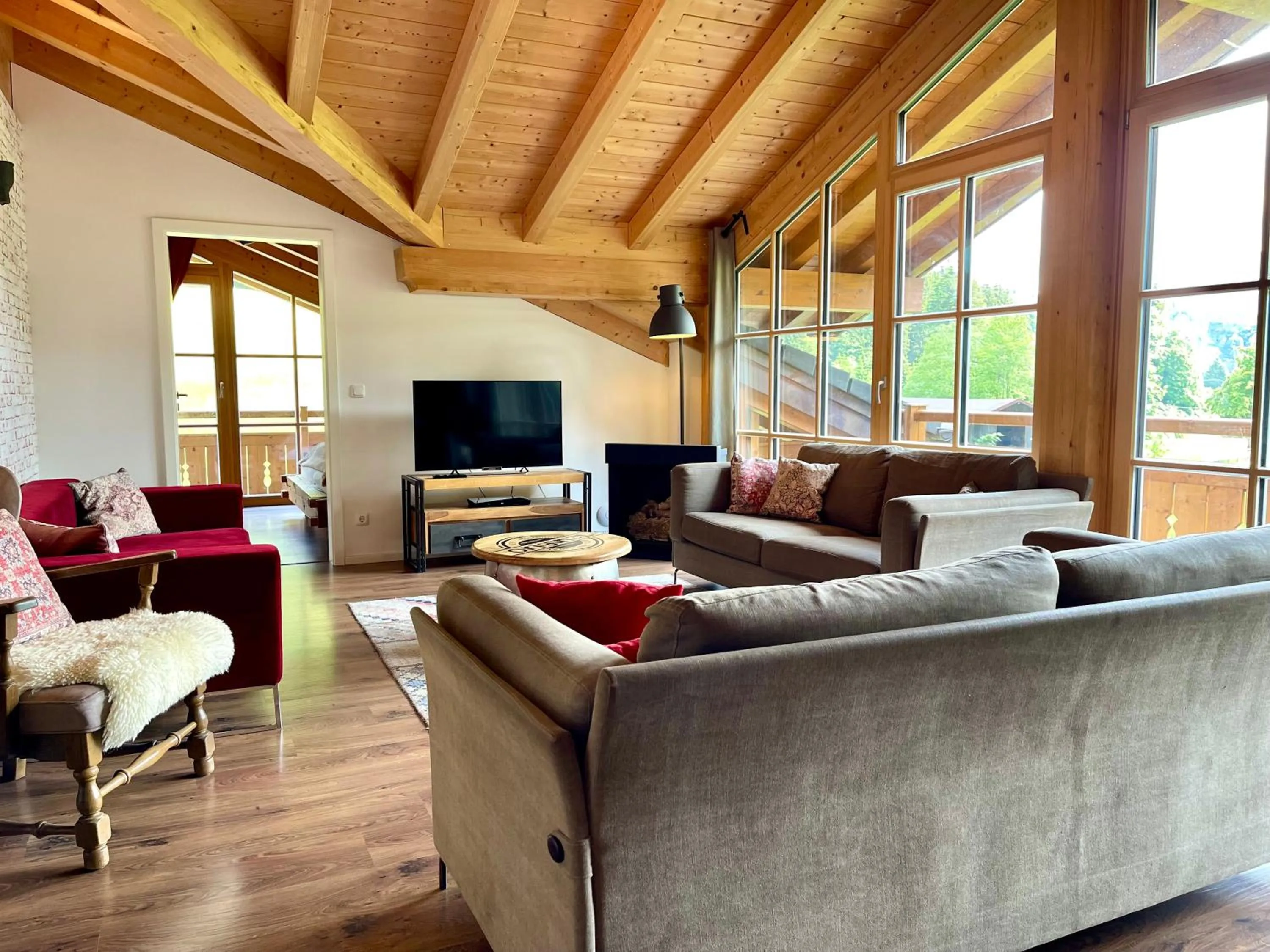 Living room in Alpenlodge Charivari - SommerBergBahn unlimited kostenlos