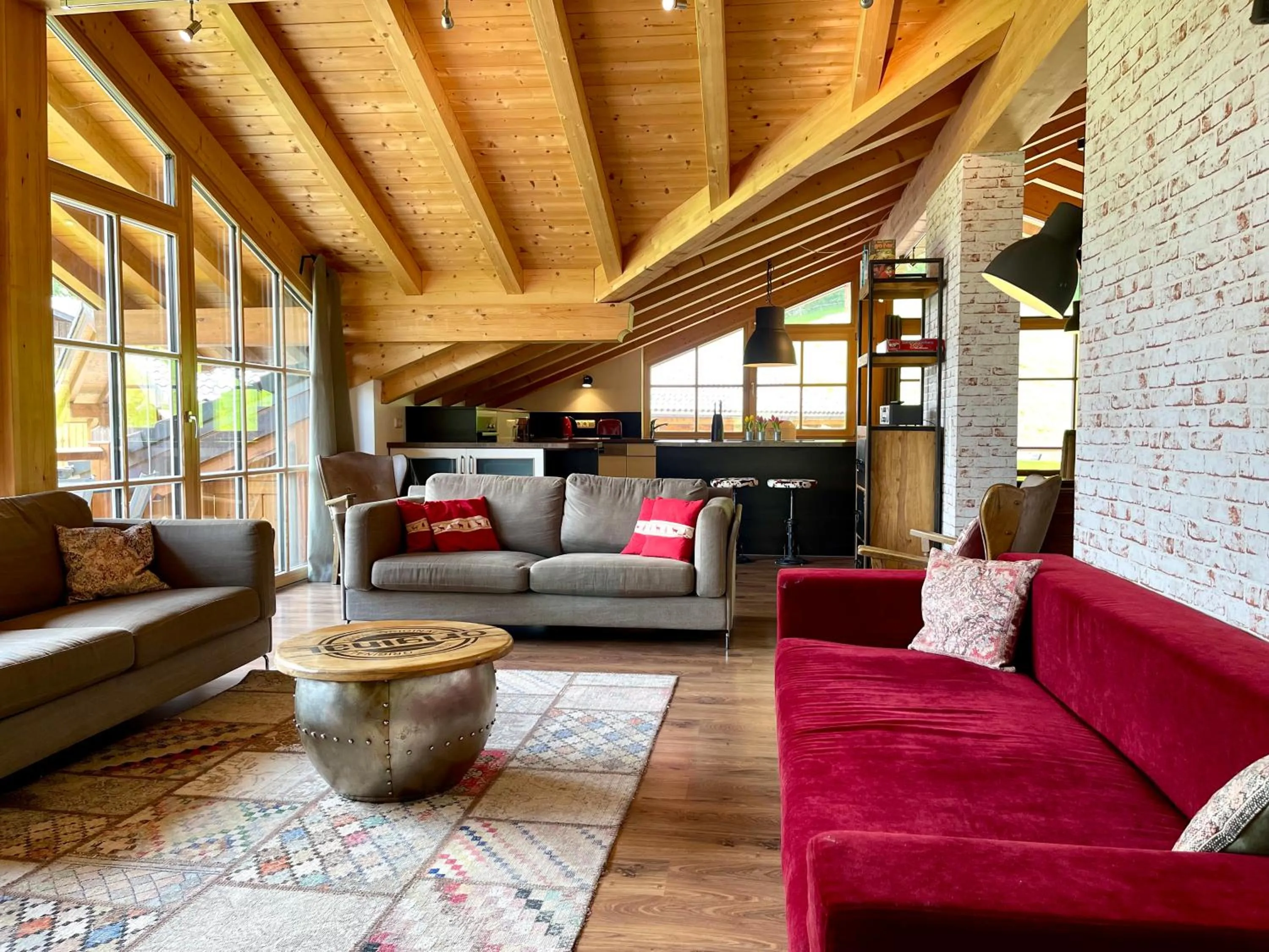 Living room in Alpenlodge Charivari - SommerBergBahn unlimited kostenlos