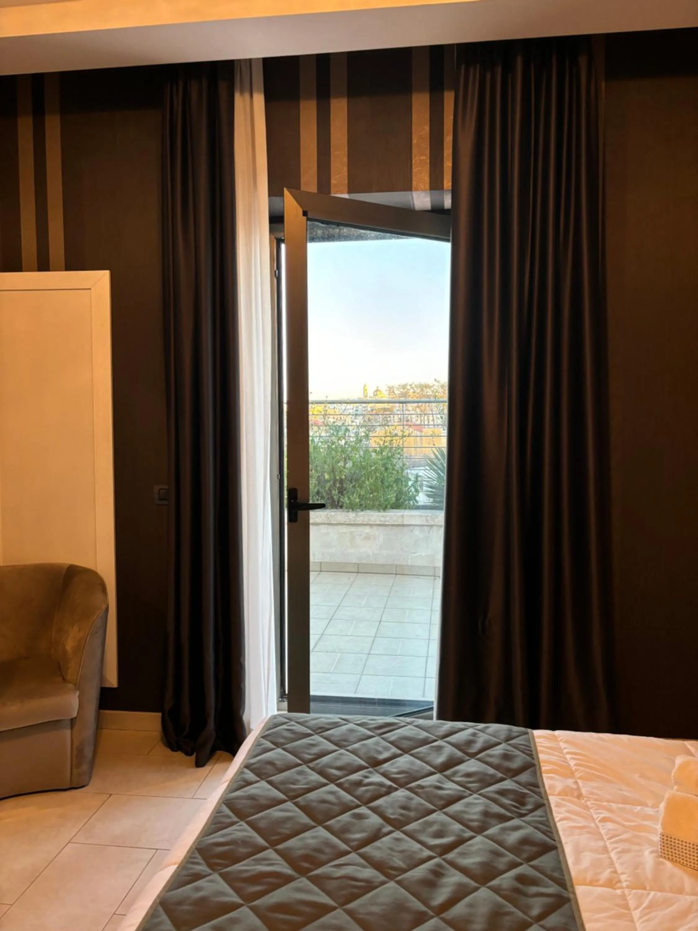 Bed in Hotel Donna Crescenza