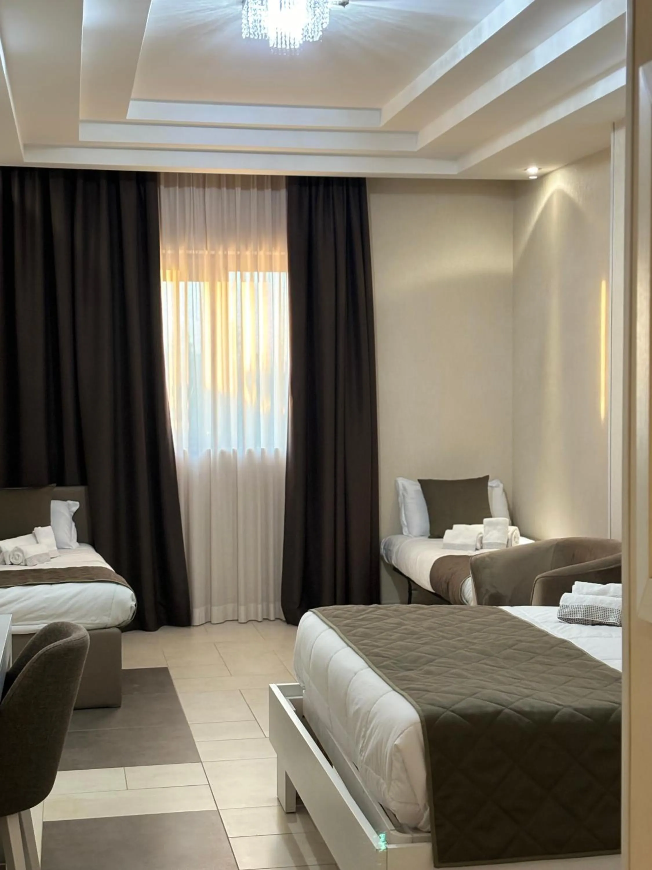Bed in Hotel Donna Crescenza