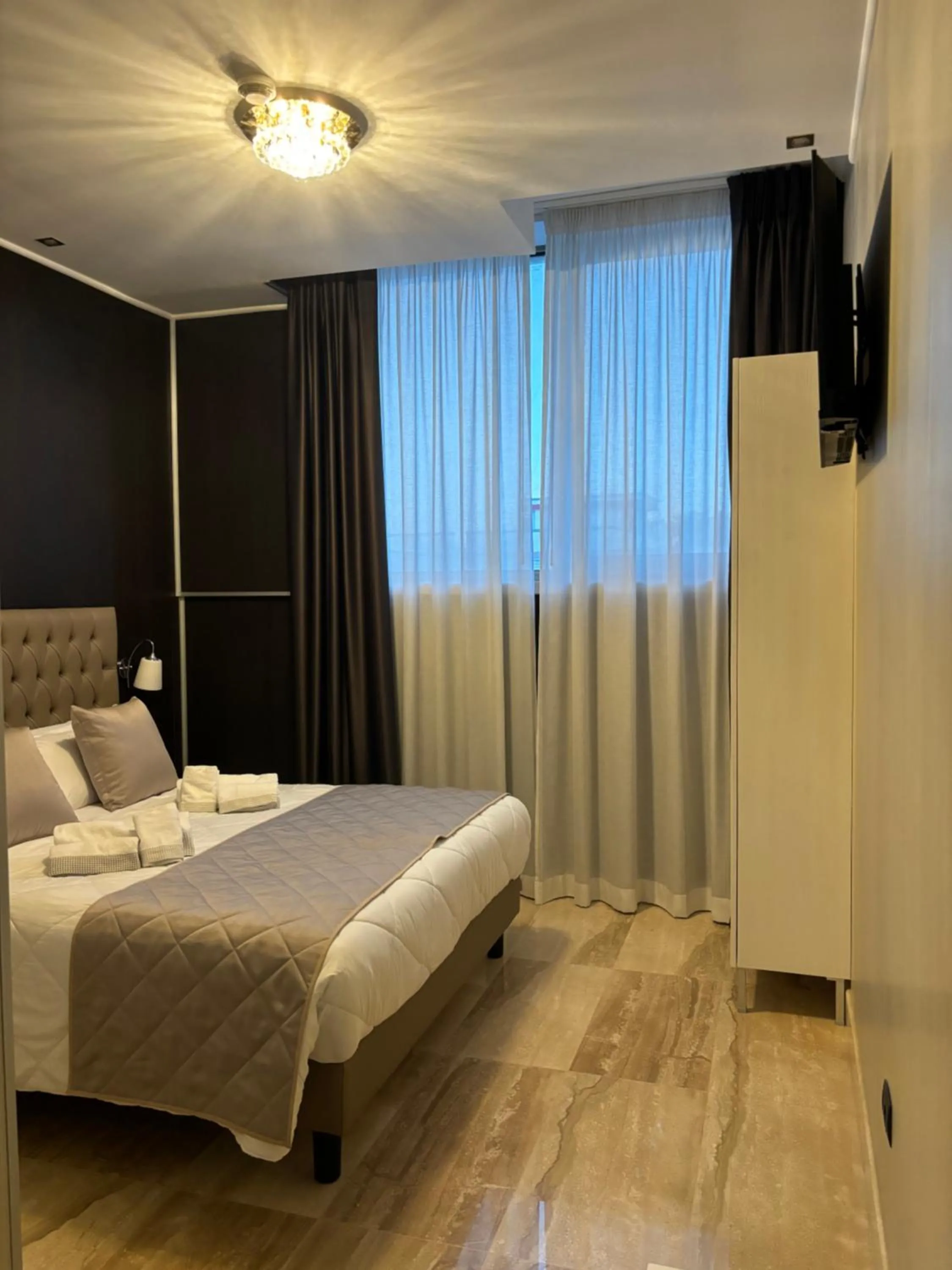 Bed in Hotel Donna Crescenza