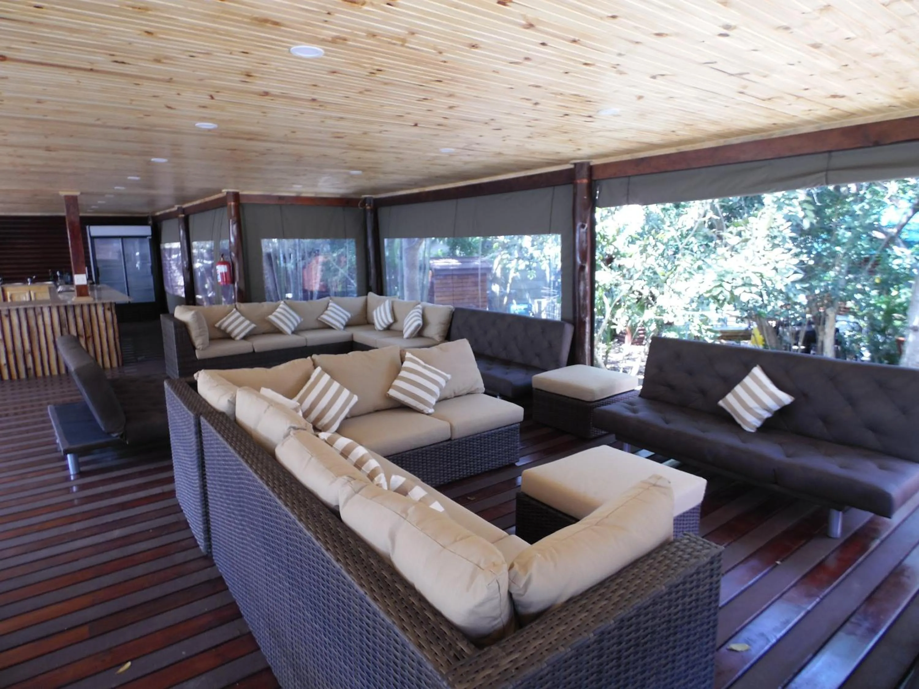 Communal lounge/ TV room in The Tree Top Village Urban Glamping