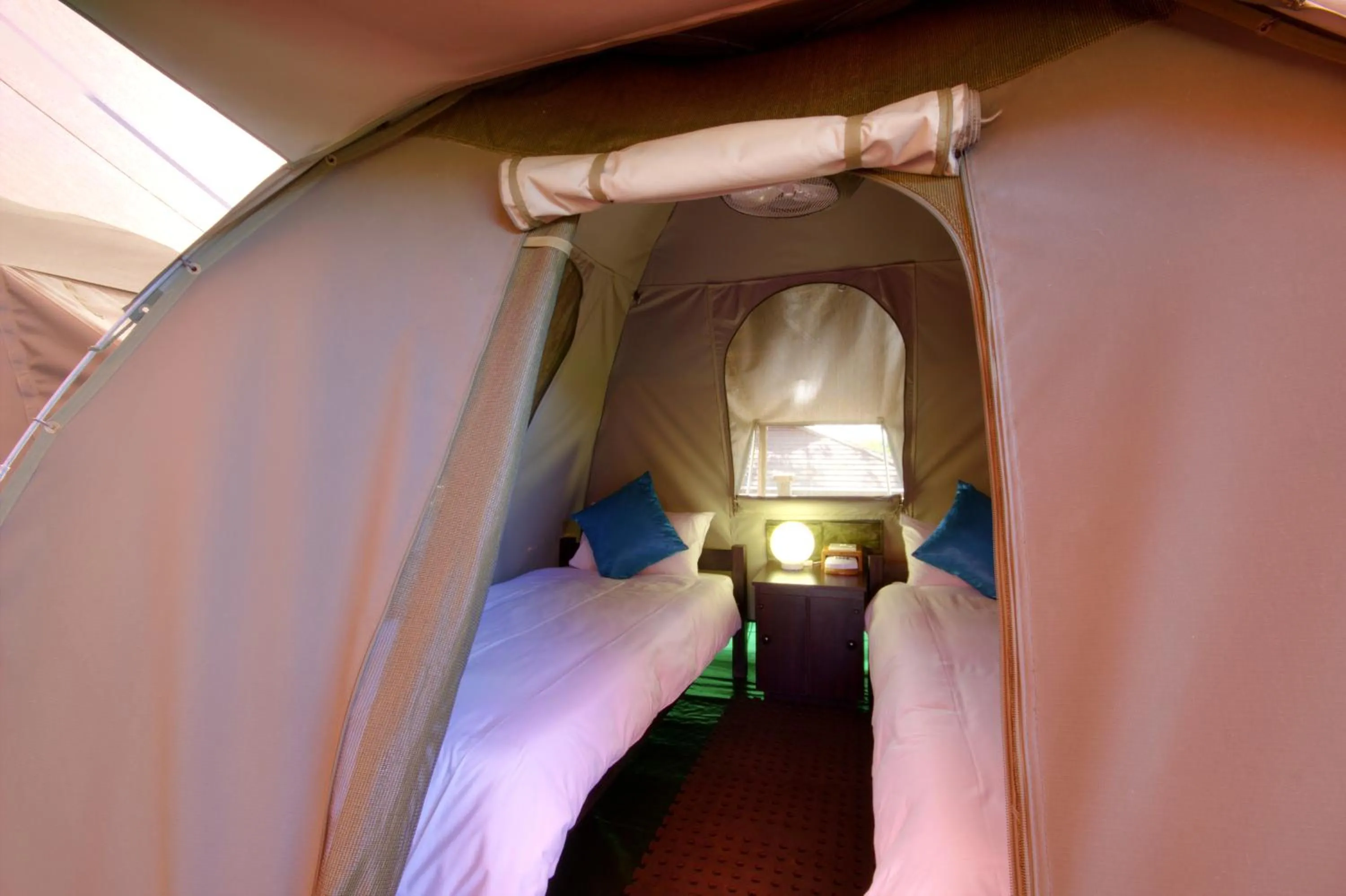 Bed in The Tree Top Village Urban Glamping