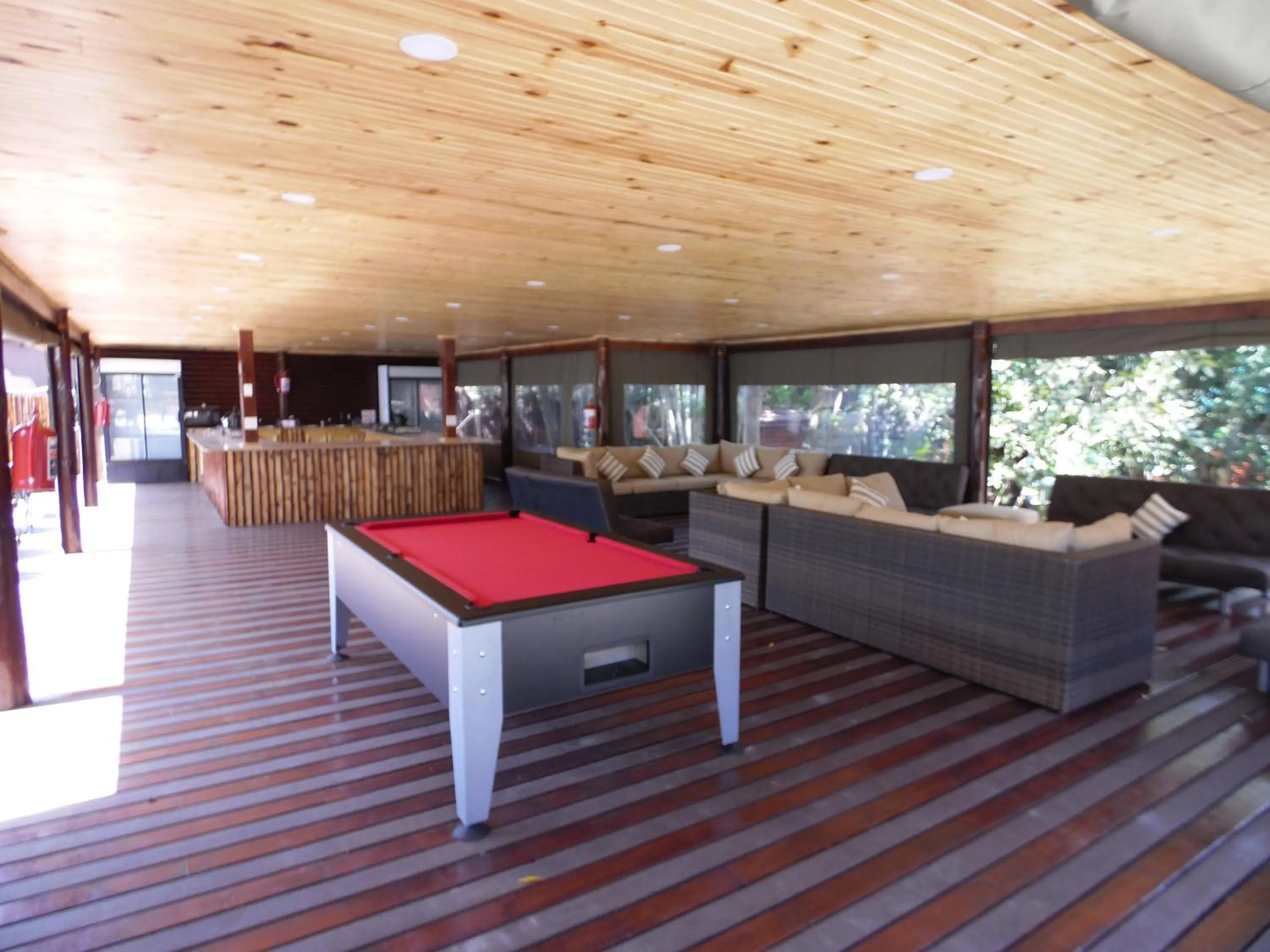 Communal lounge/ TV room in The Tree Top Village Urban Glamping