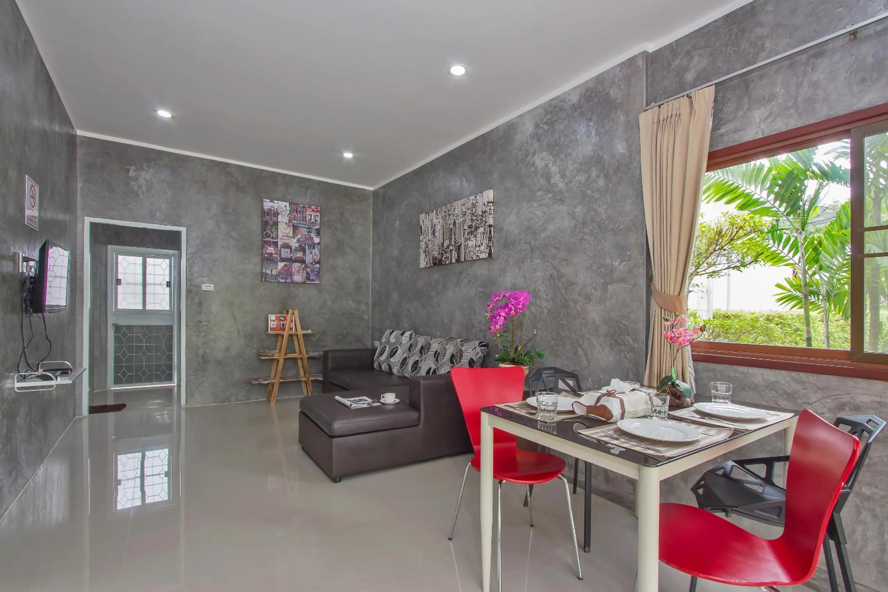 Living room in Maikhao Home Garden Bungalow