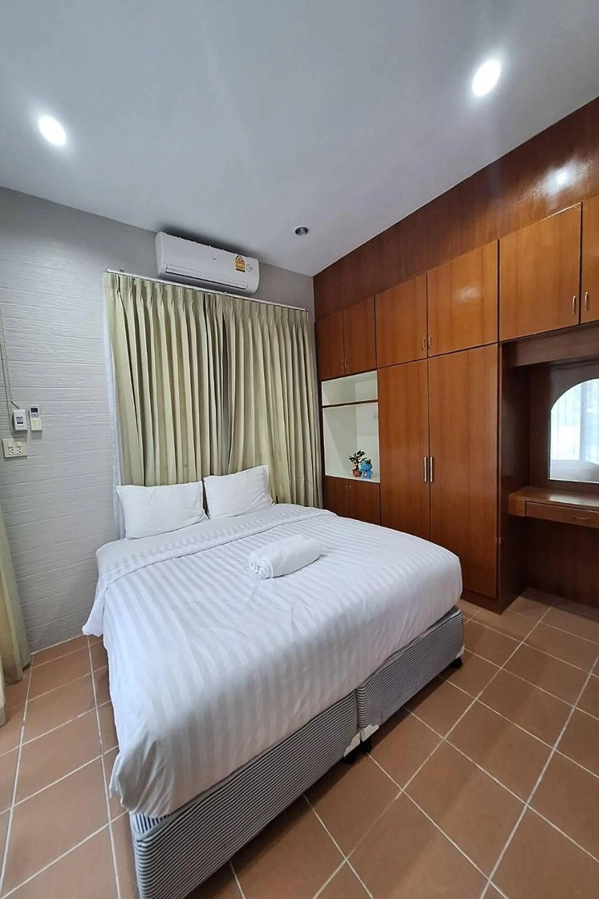 Bed in Maikhao Home Garden Bungalow