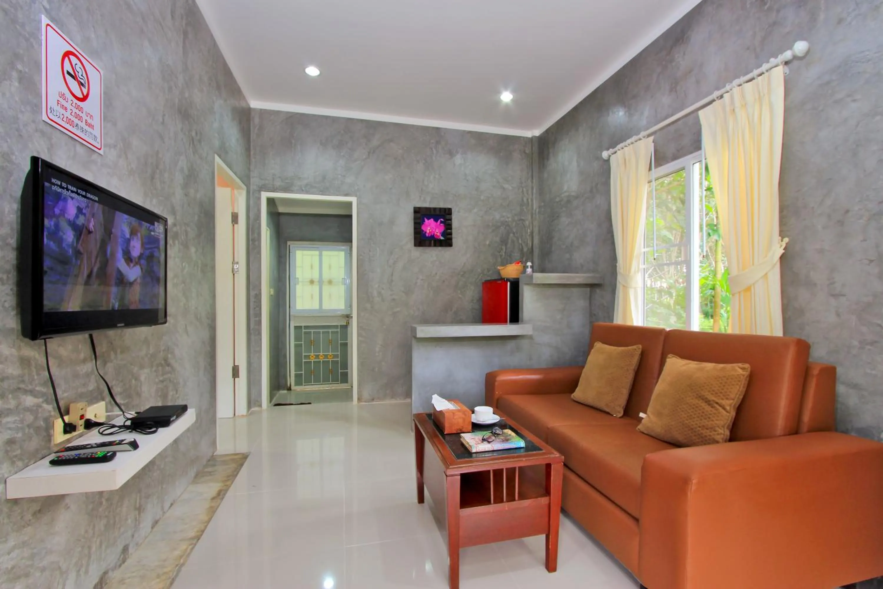 TV and multimedia in Maikhao Home Garden Bungalow