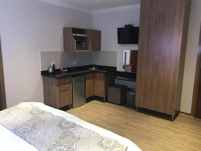 Kitchen or kitchenette in TeBeacon Accommodation
