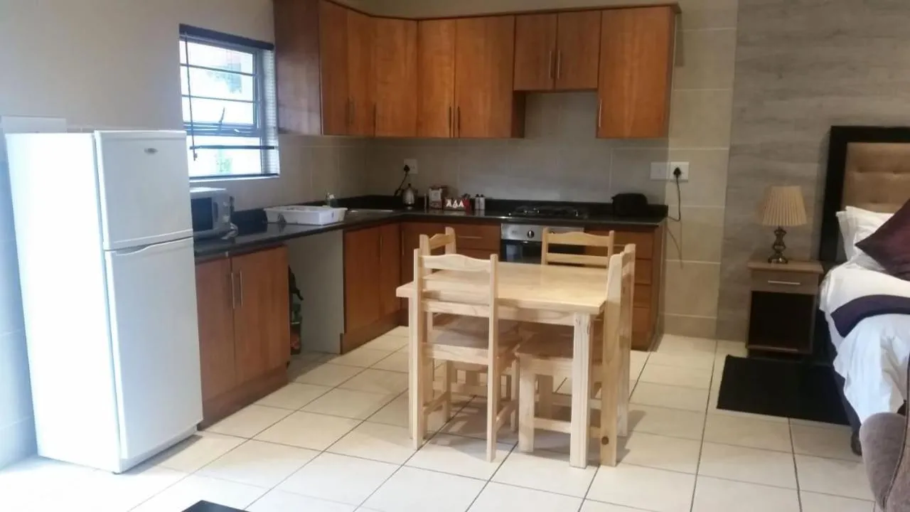 Kitchen or kitchenette in TeBeacon Accommodation
