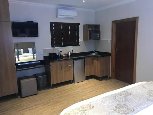 Kitchen or kitchenette in TeBeacon Accommodation