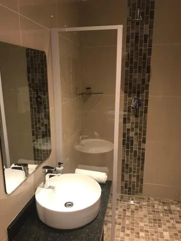 Shower in TeBeacon Accommodation
