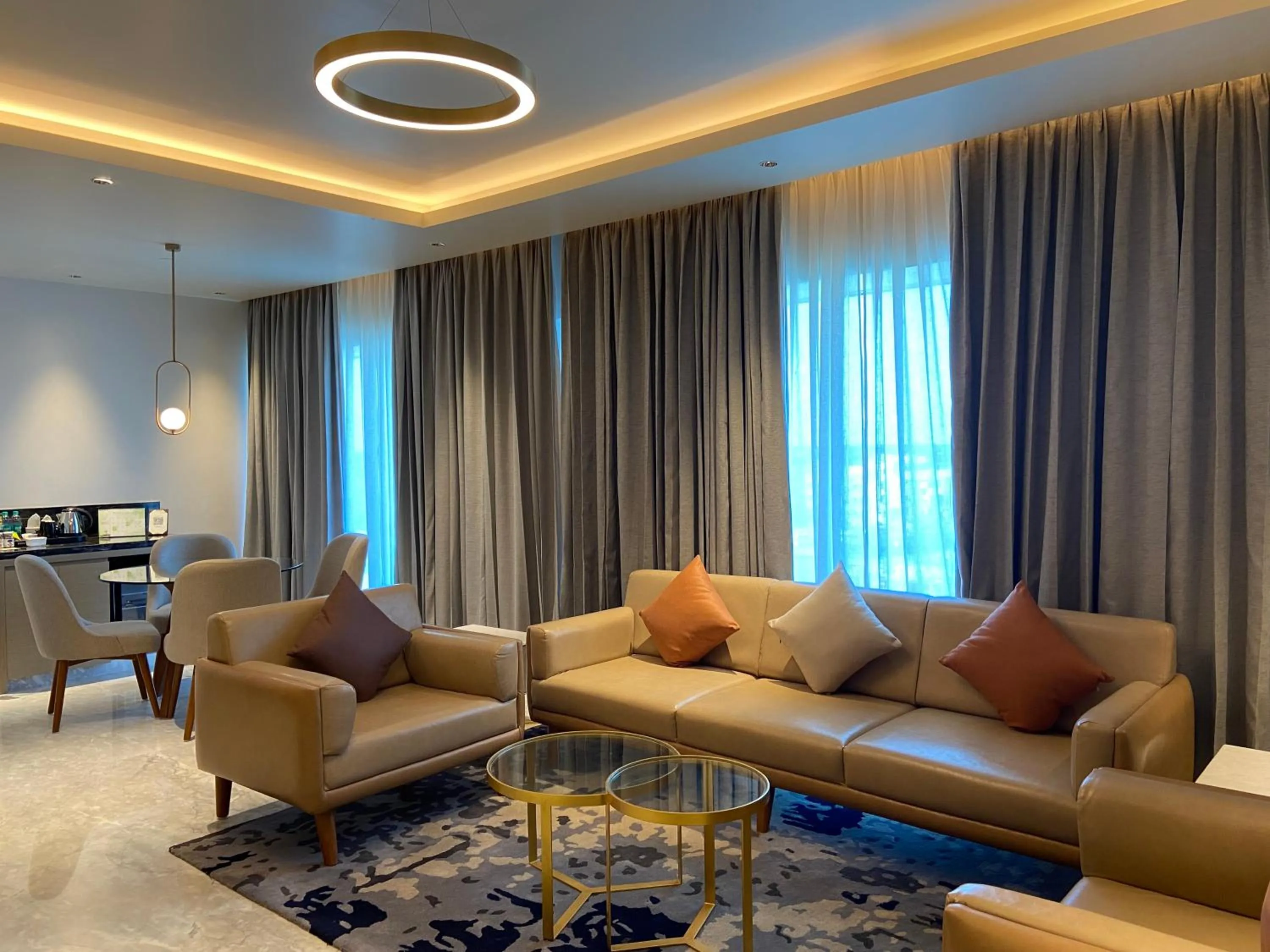 Living room in Grand Madurai by GRT Hotels