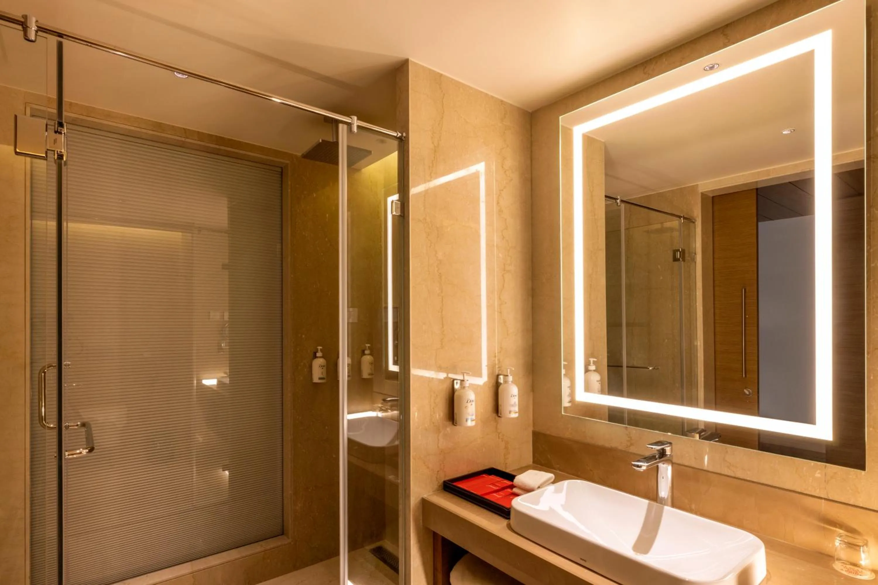 Bathroom in Grand Madurai by GRT Hotels