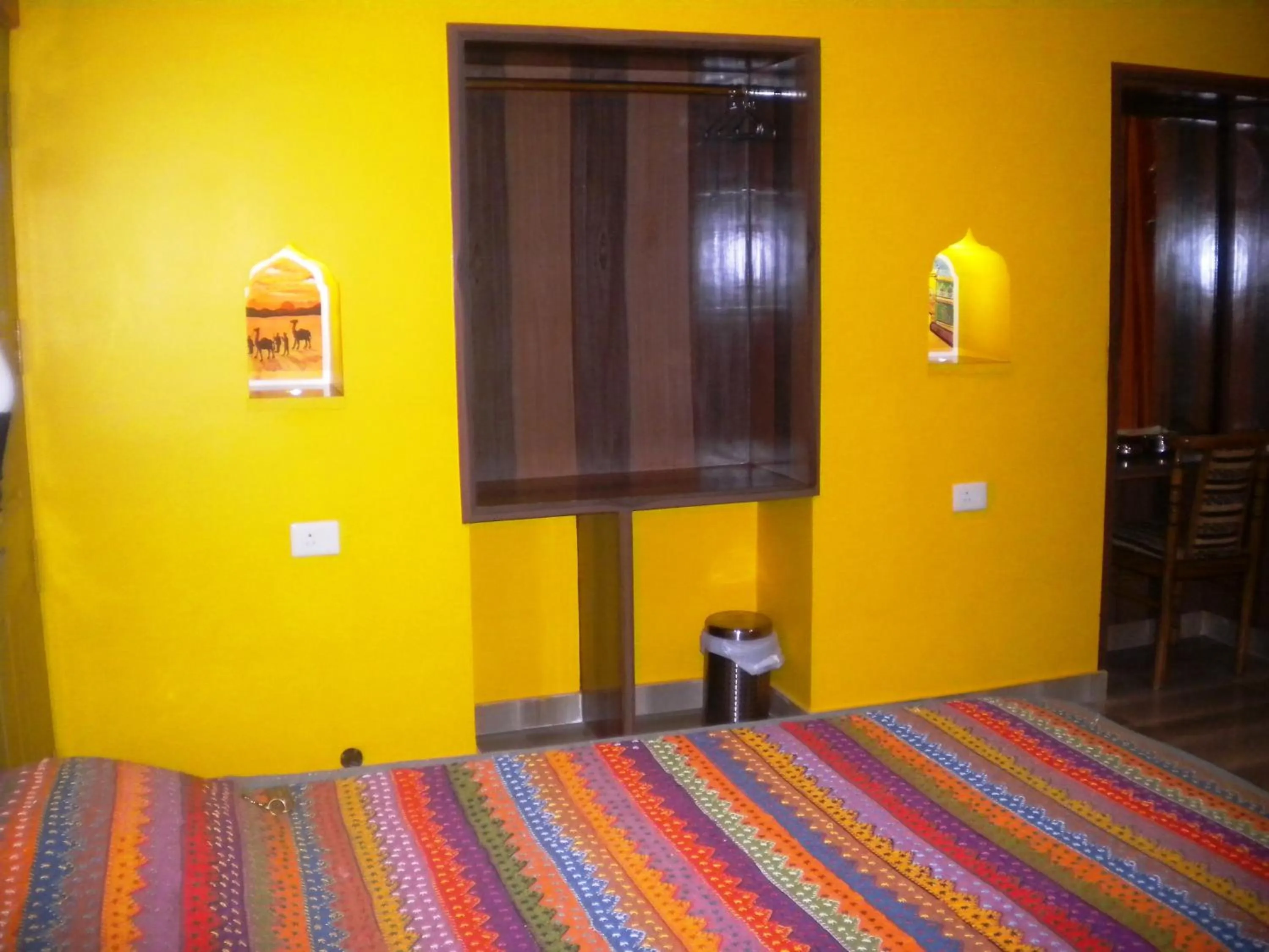 Photo of the whole room, Bed in Ganpati Guest House