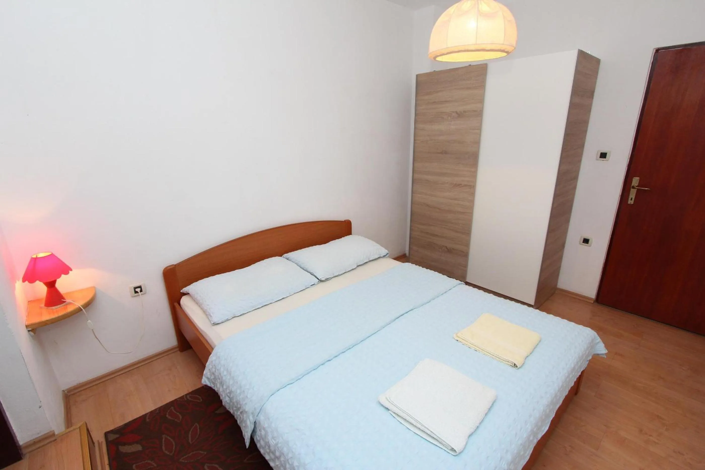 Bedroom, Bed in Apartments Lora