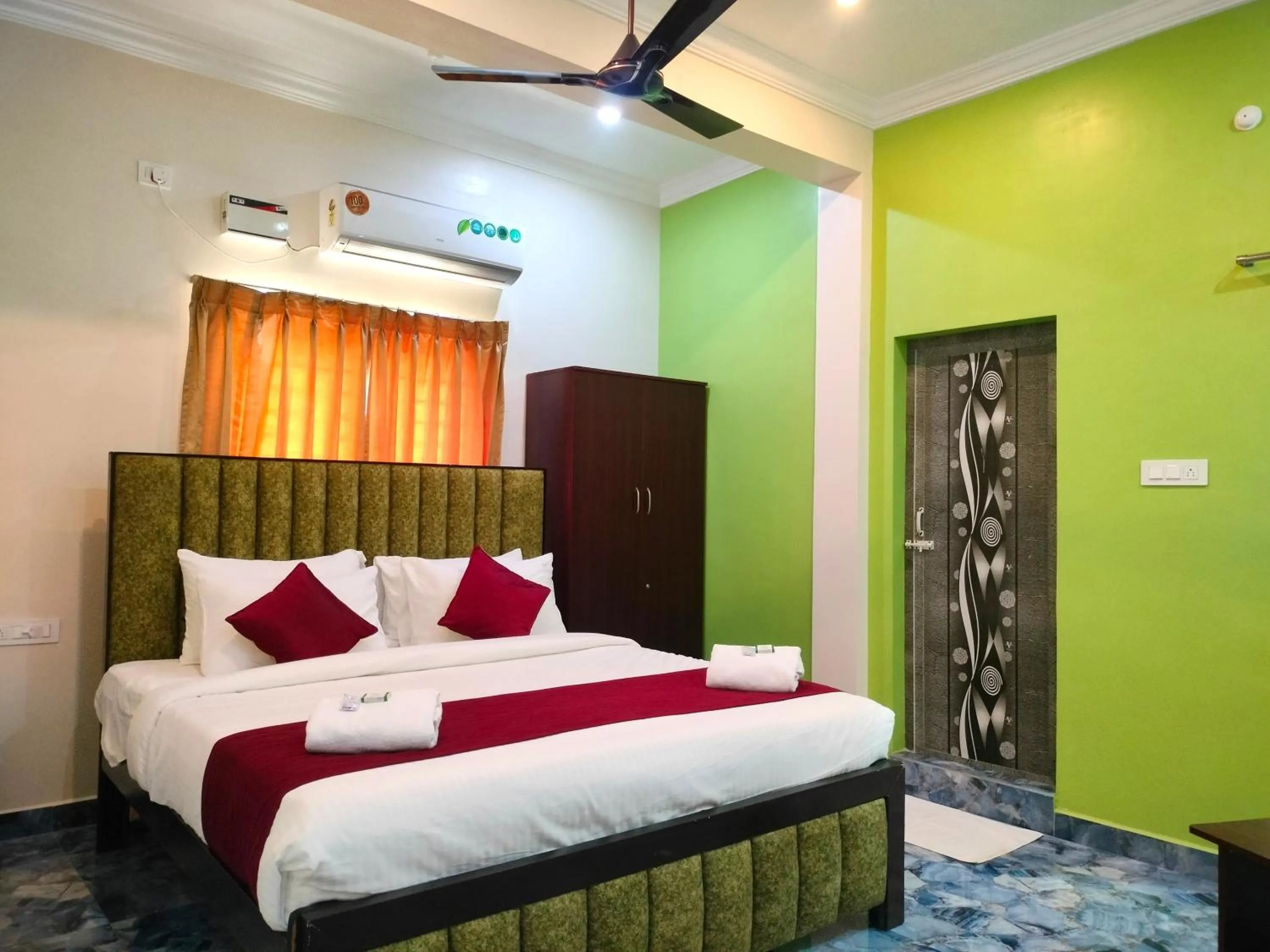 Bedroom, Bed in Hotel Abedrooms- Budget stay Thanjavur