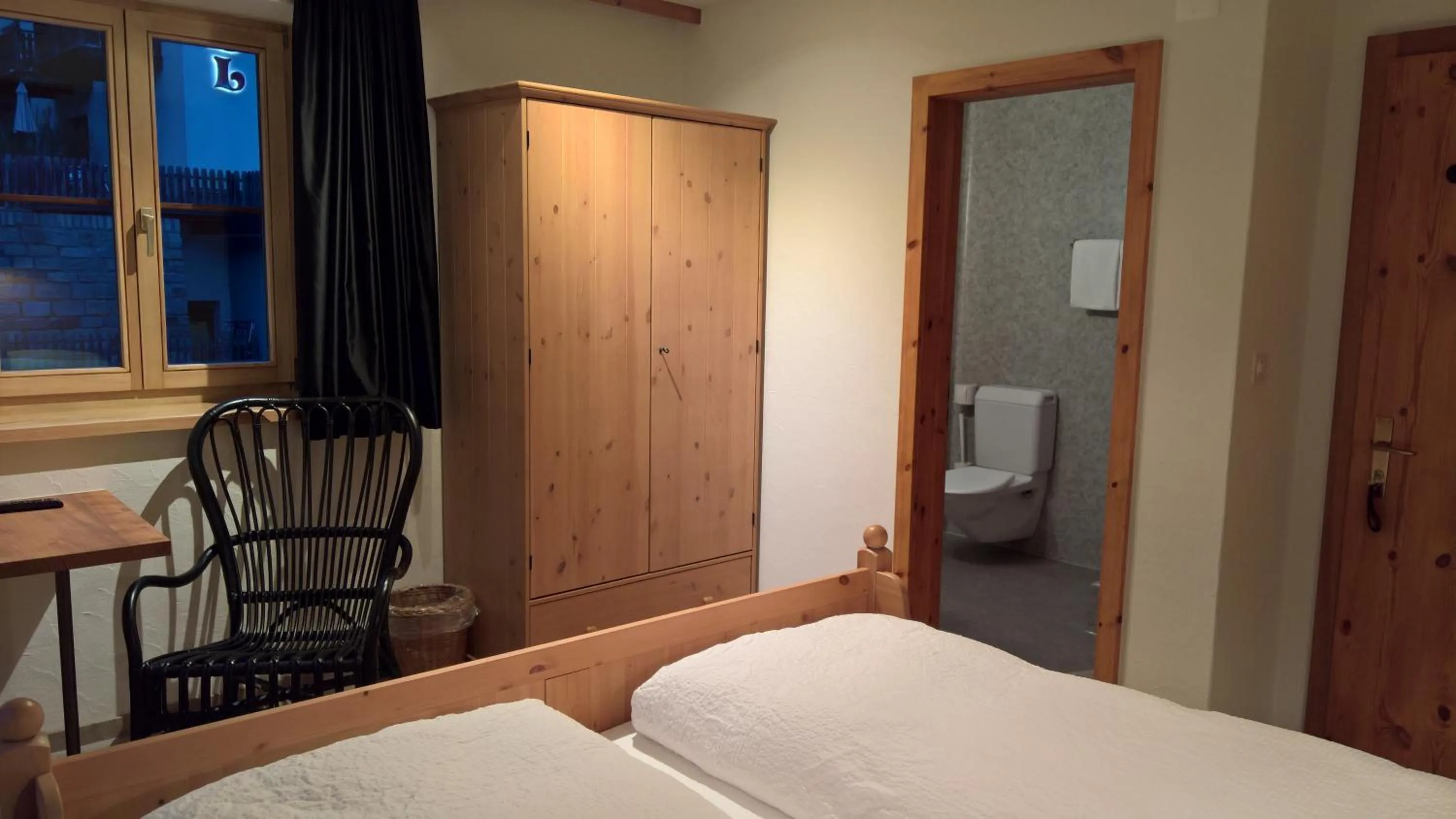 Photo of the whole room, Bed in B&B Chasa Arfusch