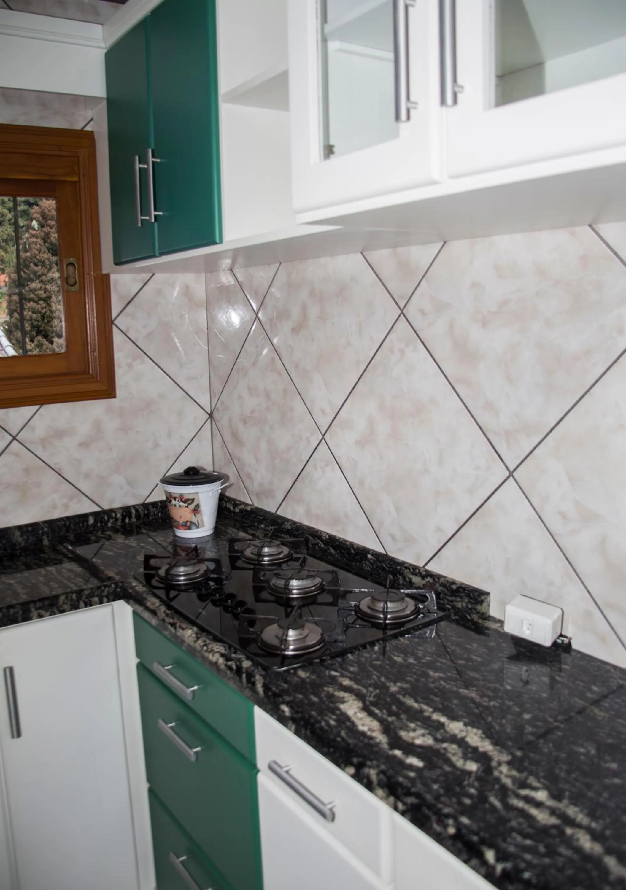 Kitchen or kitchenette in Pousada Caminho dos Plátanos