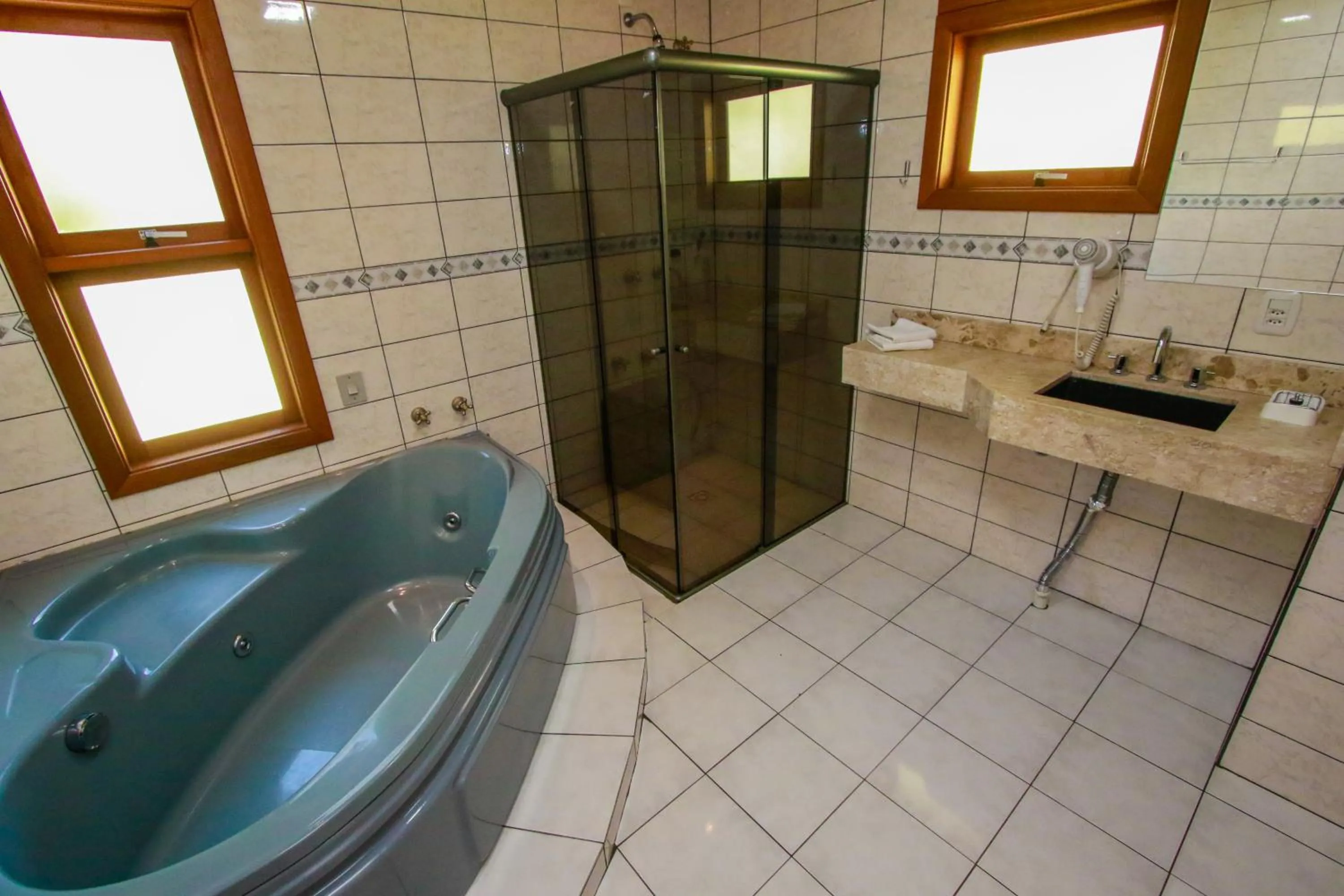 Bathroom in Pousada Caminho dos Plátanos