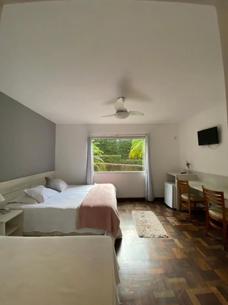 Bed in Pousada Matitaterê
