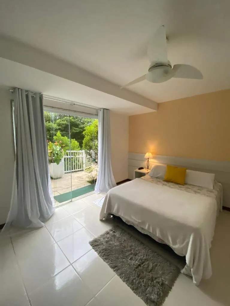 Bed in Pousada Matitaterê