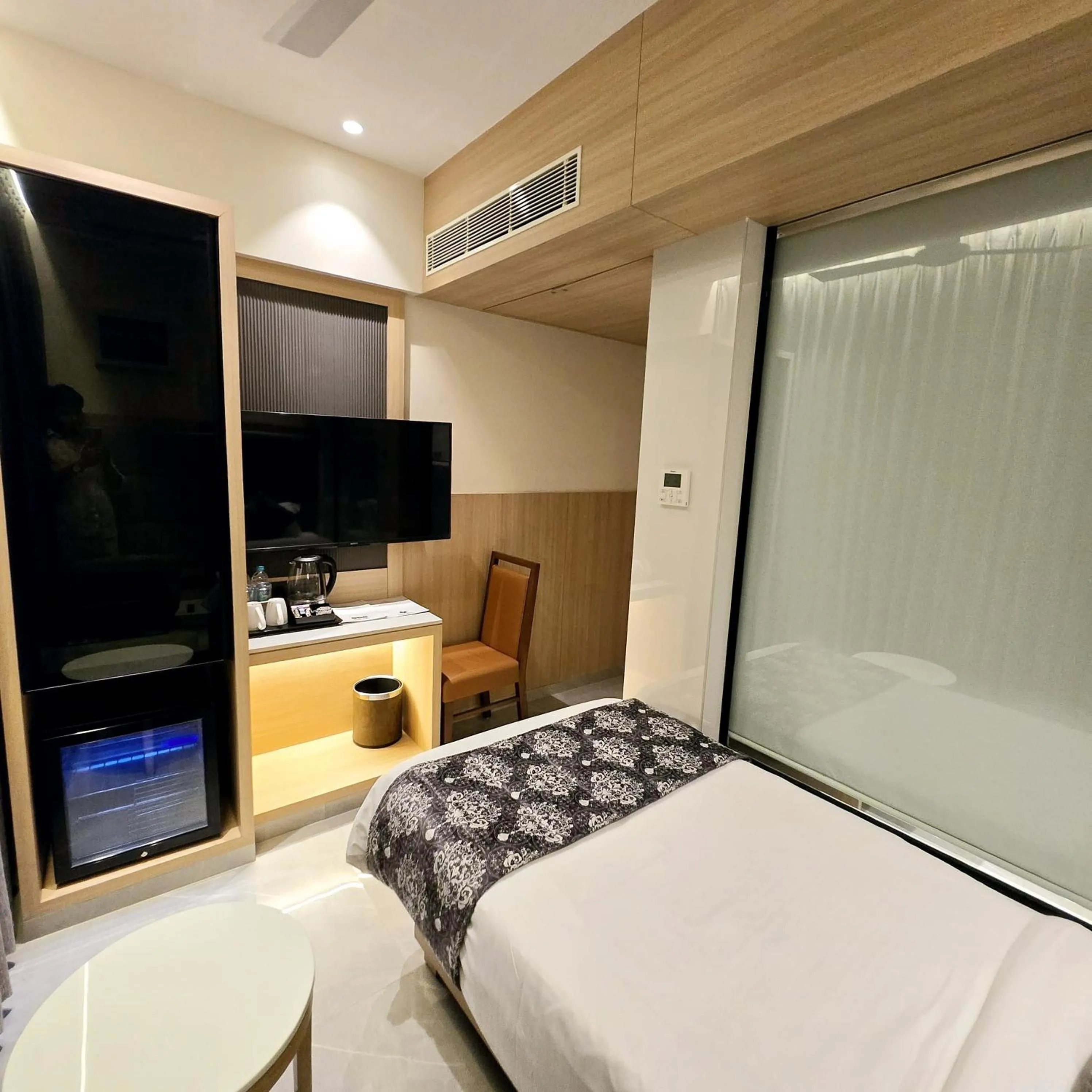 Bed in InstaFeel Hotel