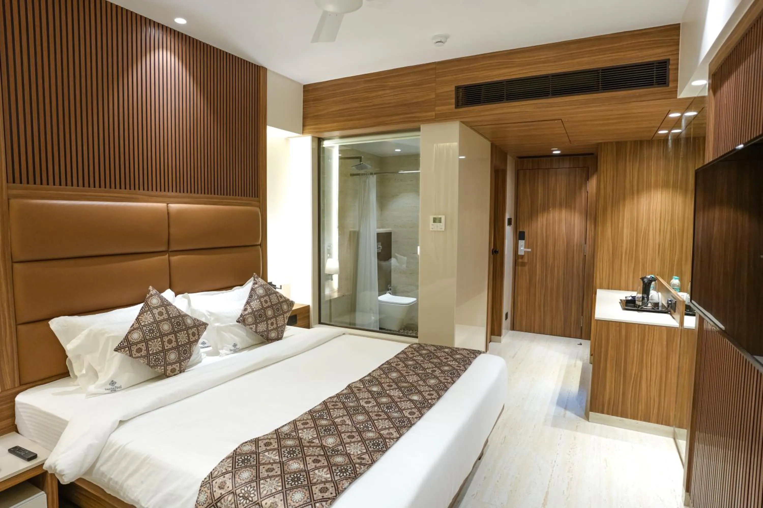 Bed in InstaFeel Hotel