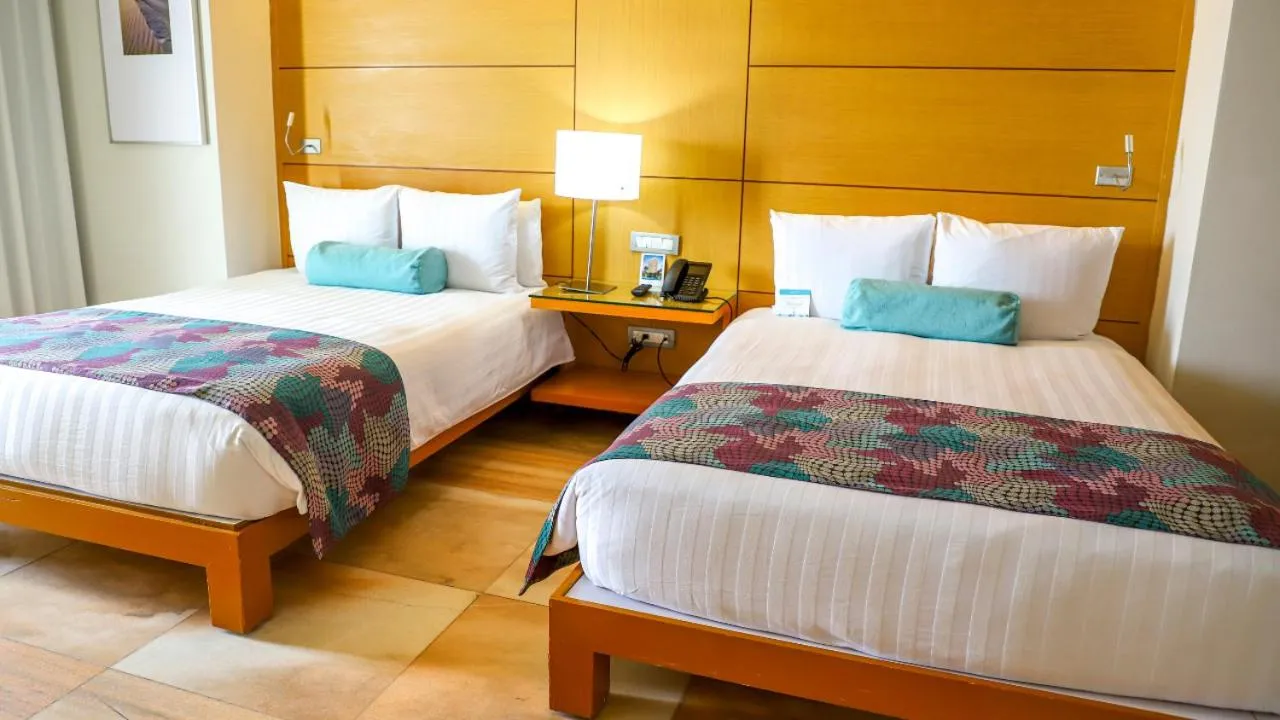 Bed in Palacio Mundo Imperial Riviera Diamante Acapulco All Inclusive