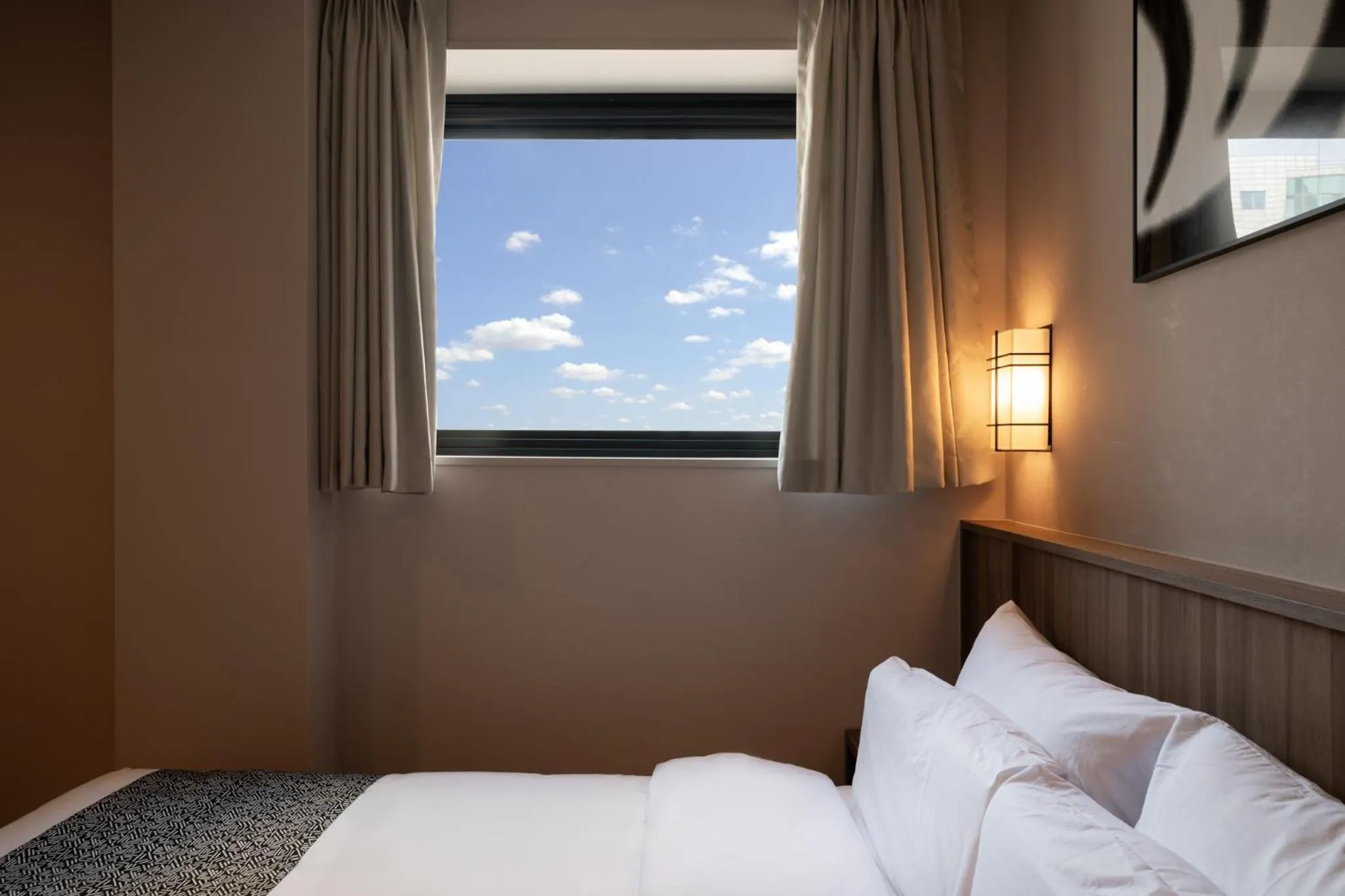 Bed in Aank Ryokan Hotel Paju