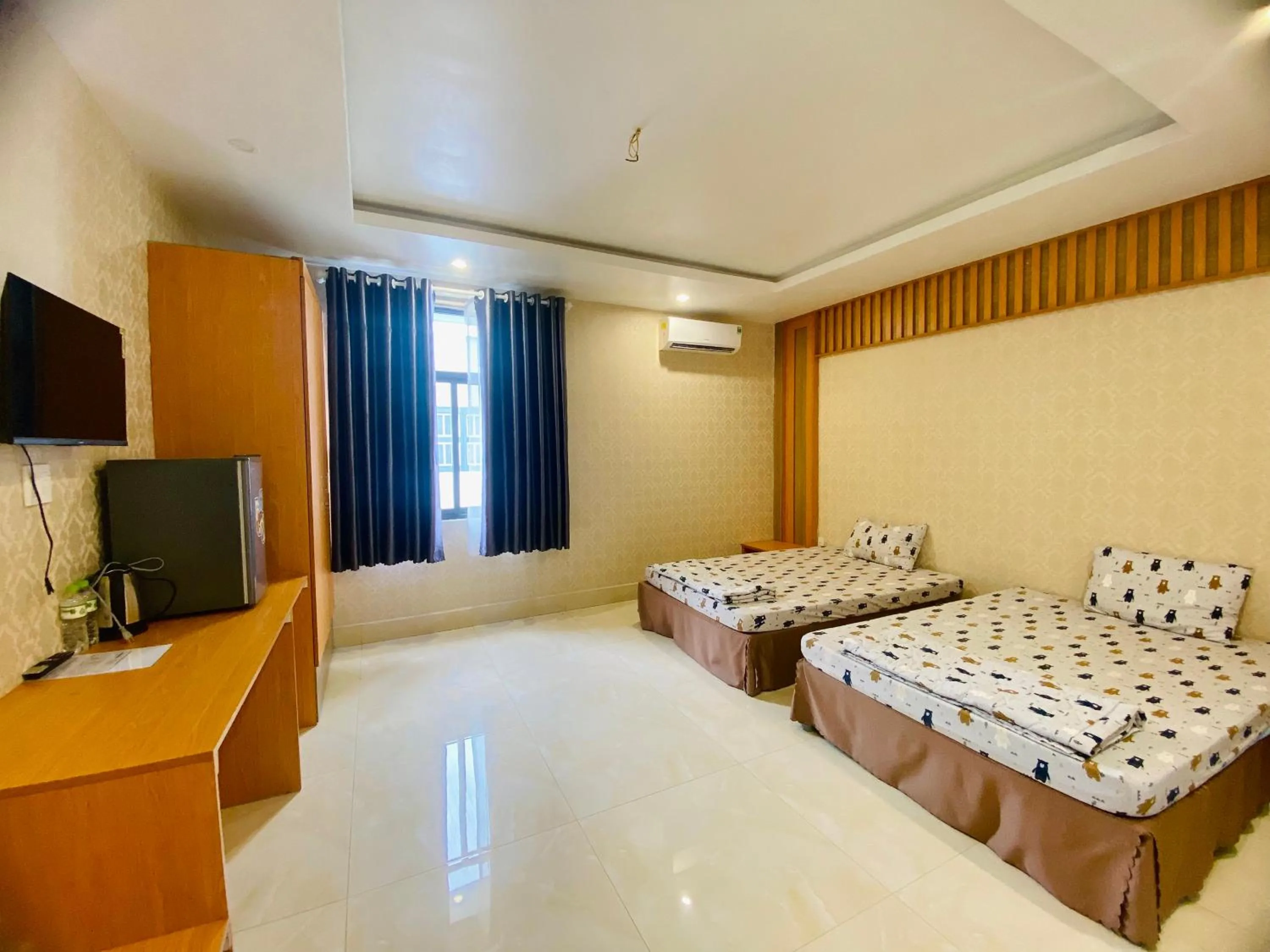 Communal lounge/ TV room, Bed in Sunny 1 Hometel Vinh Long