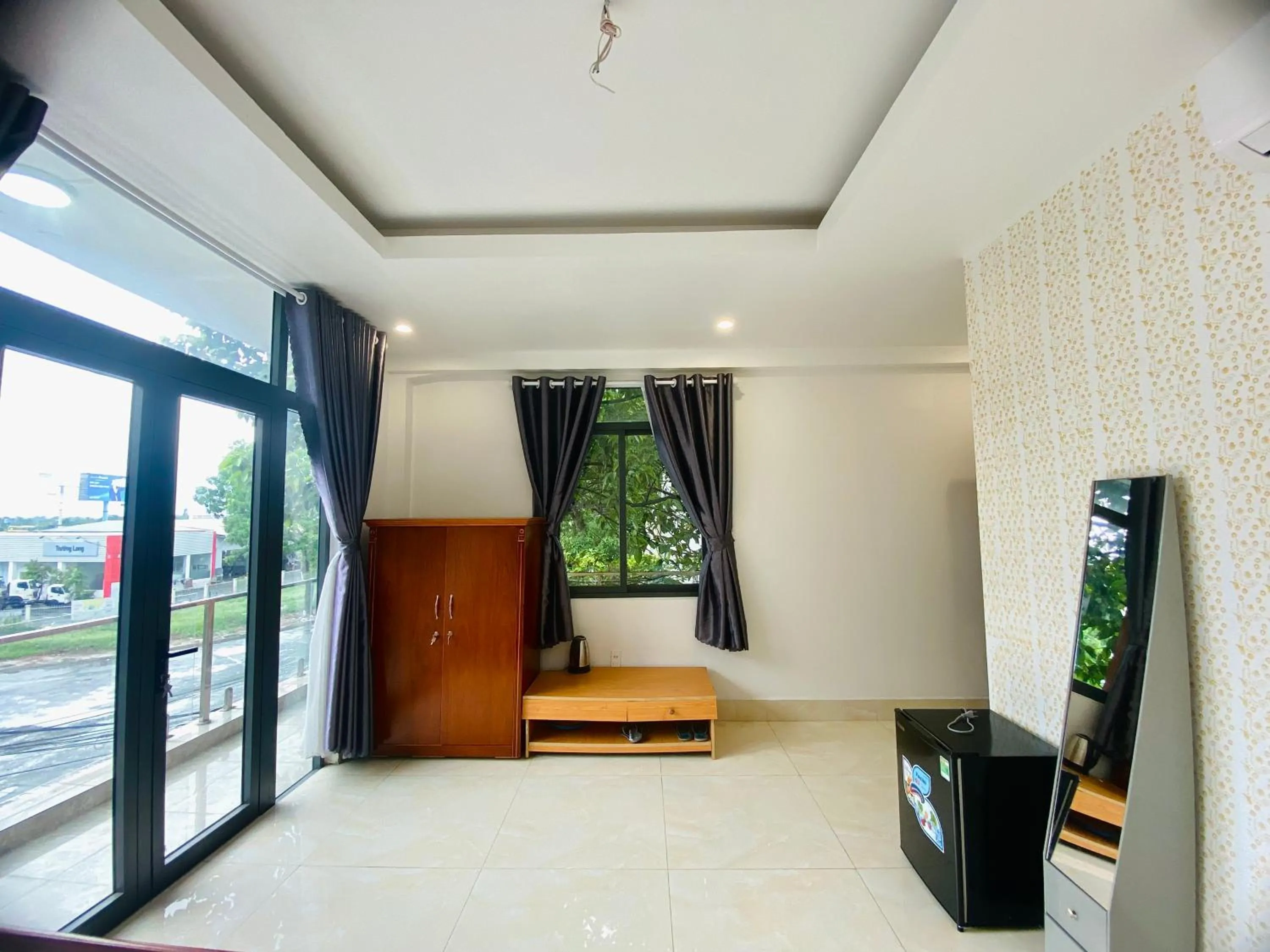 Communal lounge/ TV room in Sunny 1 Hometel Vinh Long