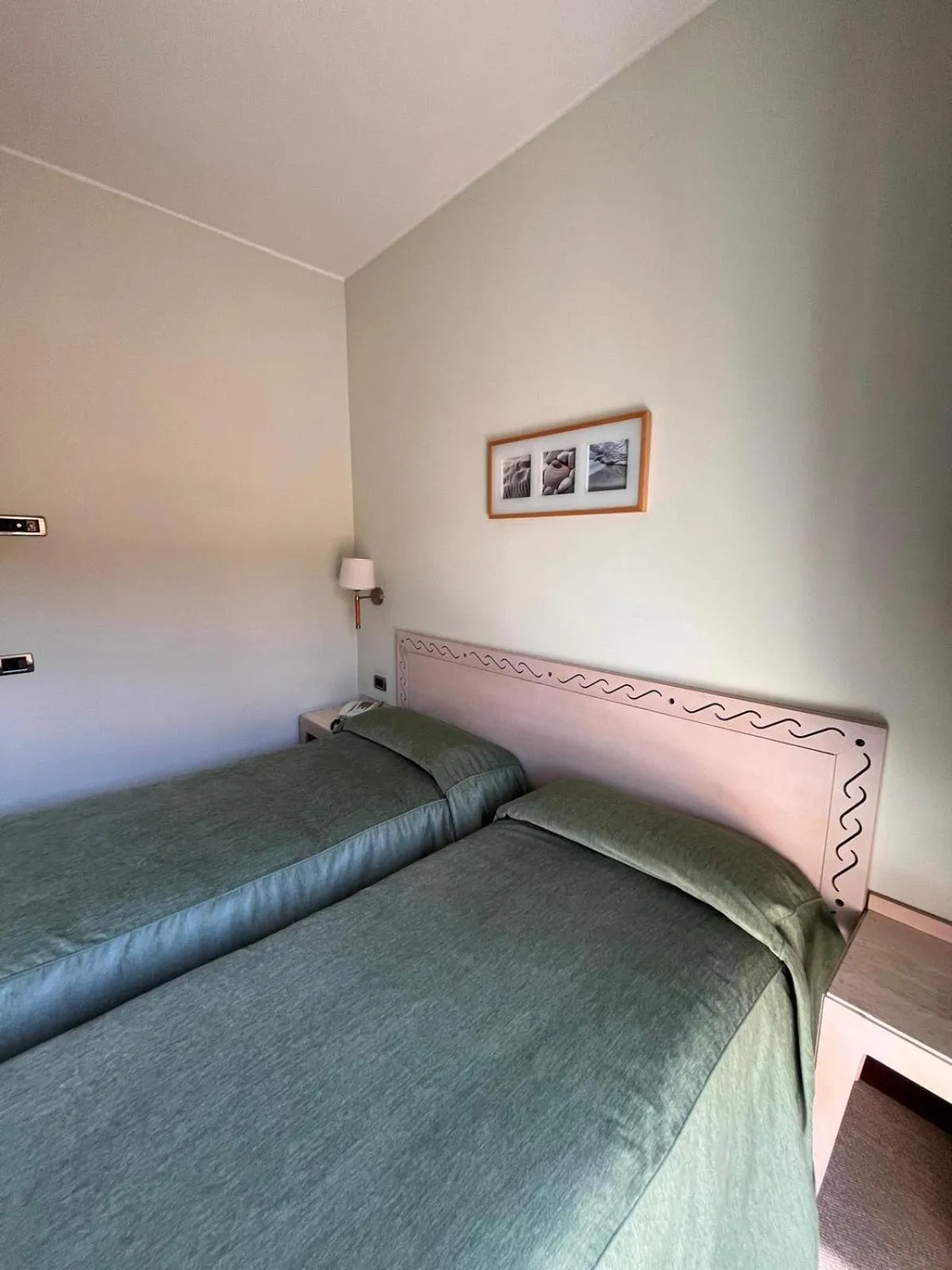 Bed in HOTEL LUDOVICO ARIOSTO