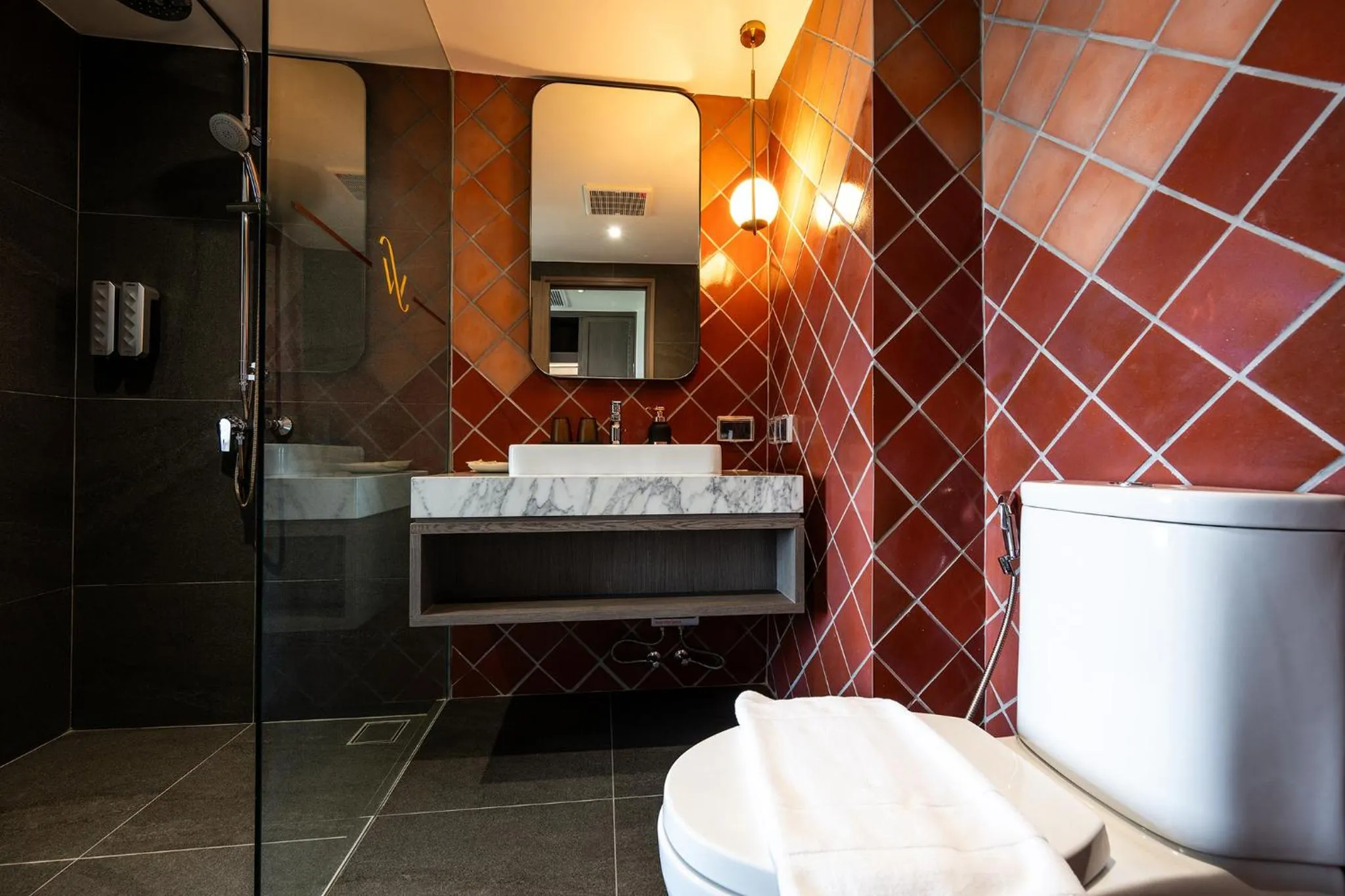 Shower in WE HOTEL RIVERFRONT