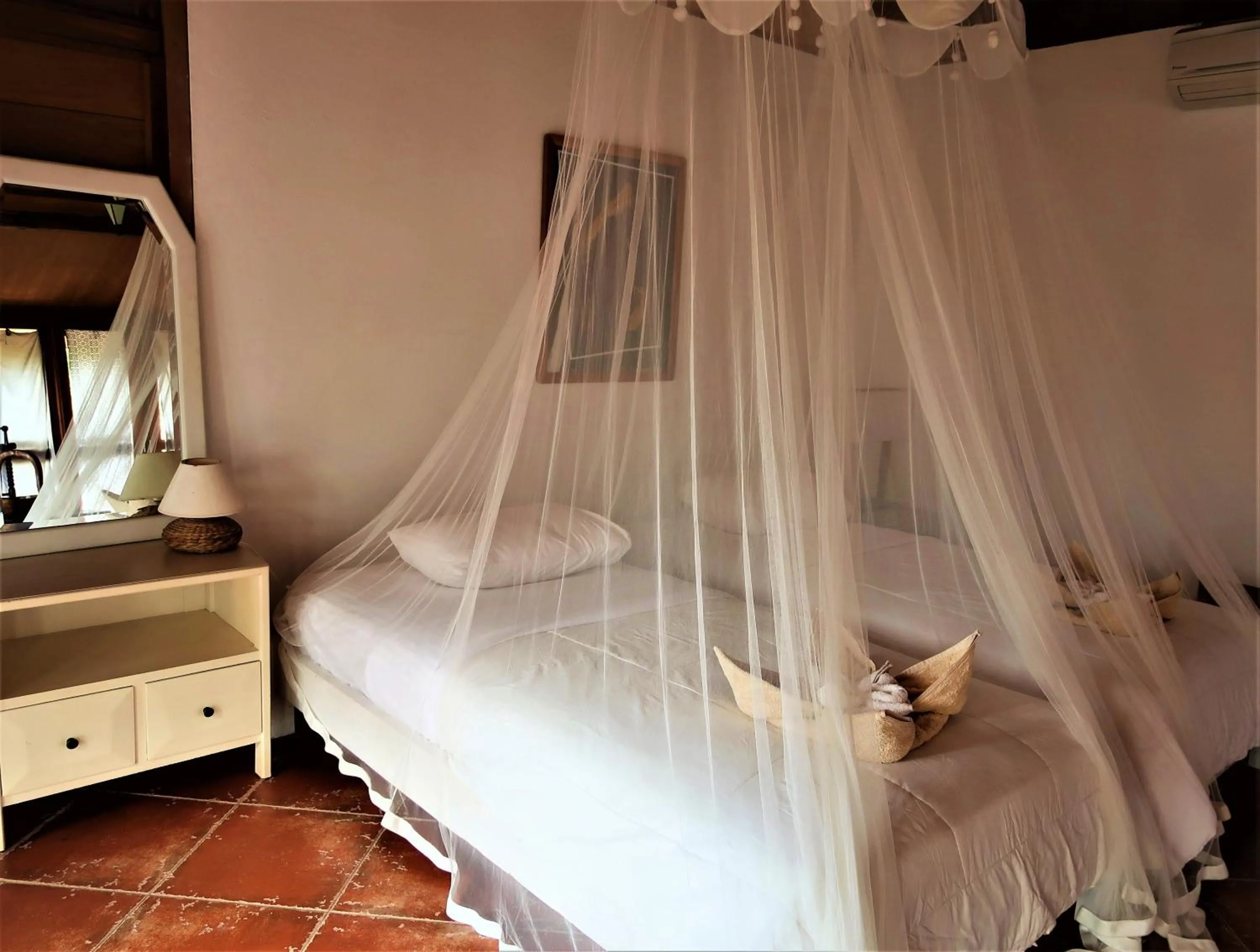 Bed in Breve Azurine Lagoon Resort