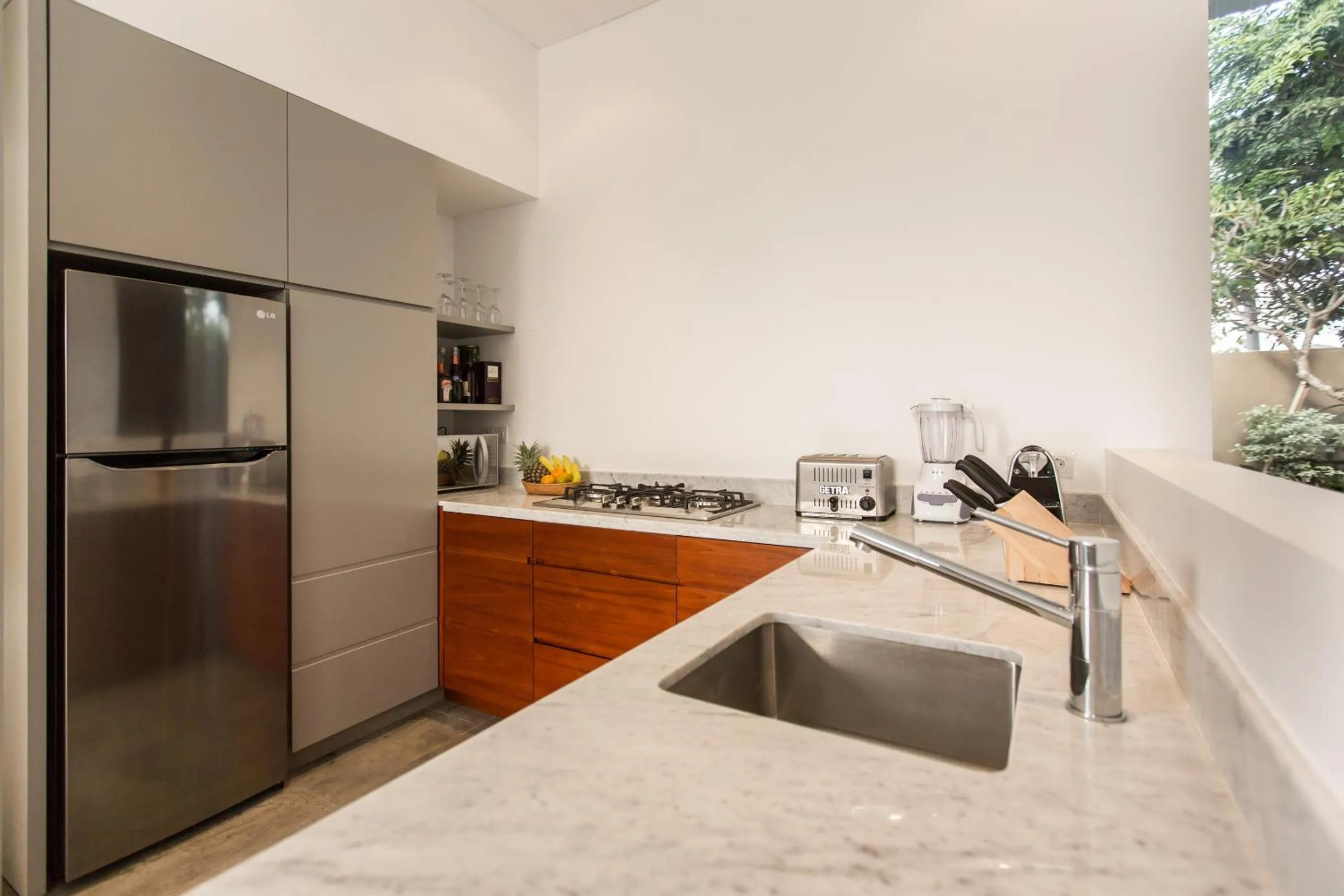 Kitchen or kitchenette in Gajah Villas Bali by Nagisa Bali